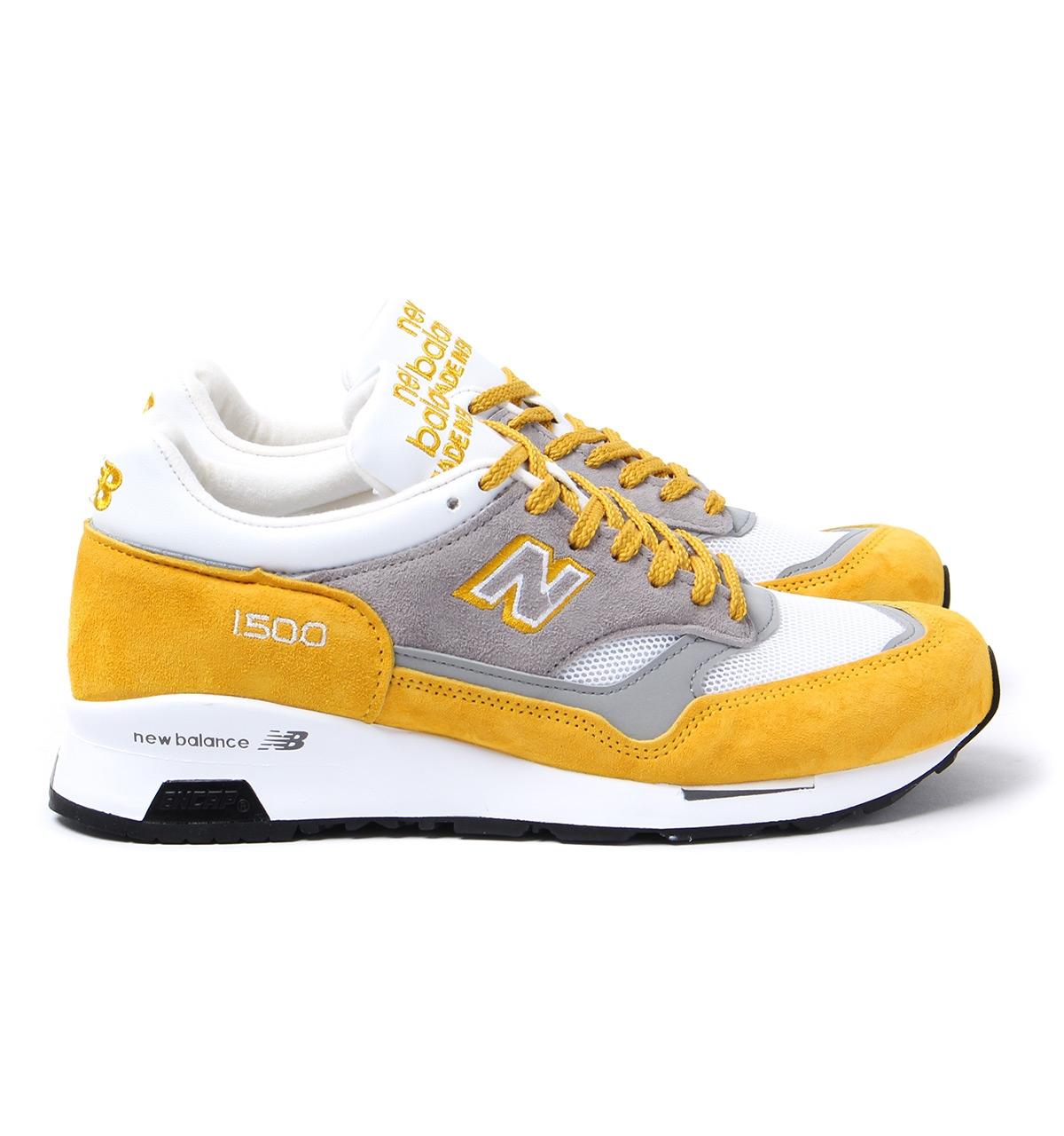 mustard new balance trainers