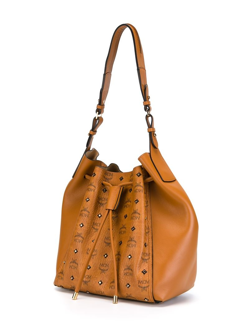 MCM 'gold Visetos Drawstring' Bucket Bag in Natural Lyst