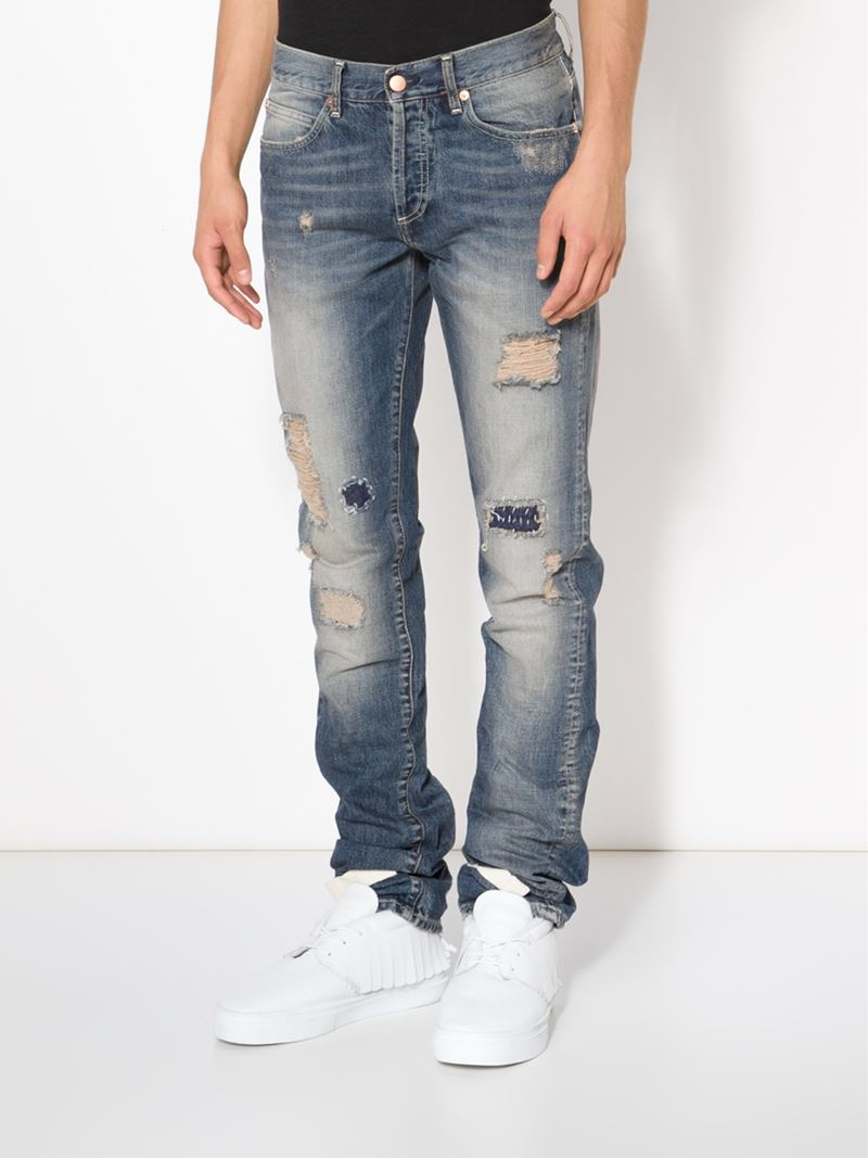 off white distressed jeans