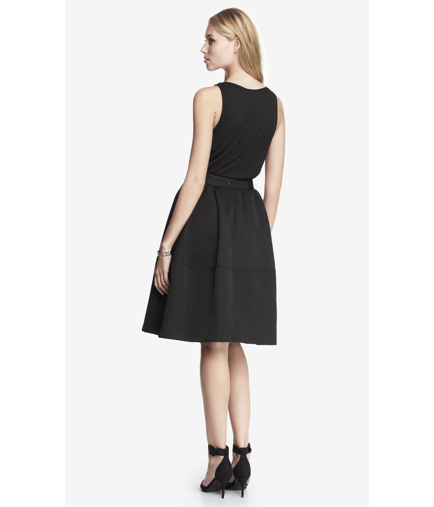 It appears you are using an Ad-blocker plugin! High waisted straight fit midi skirt with large utilitarian patch pockets. Length of skirt: 72cm /