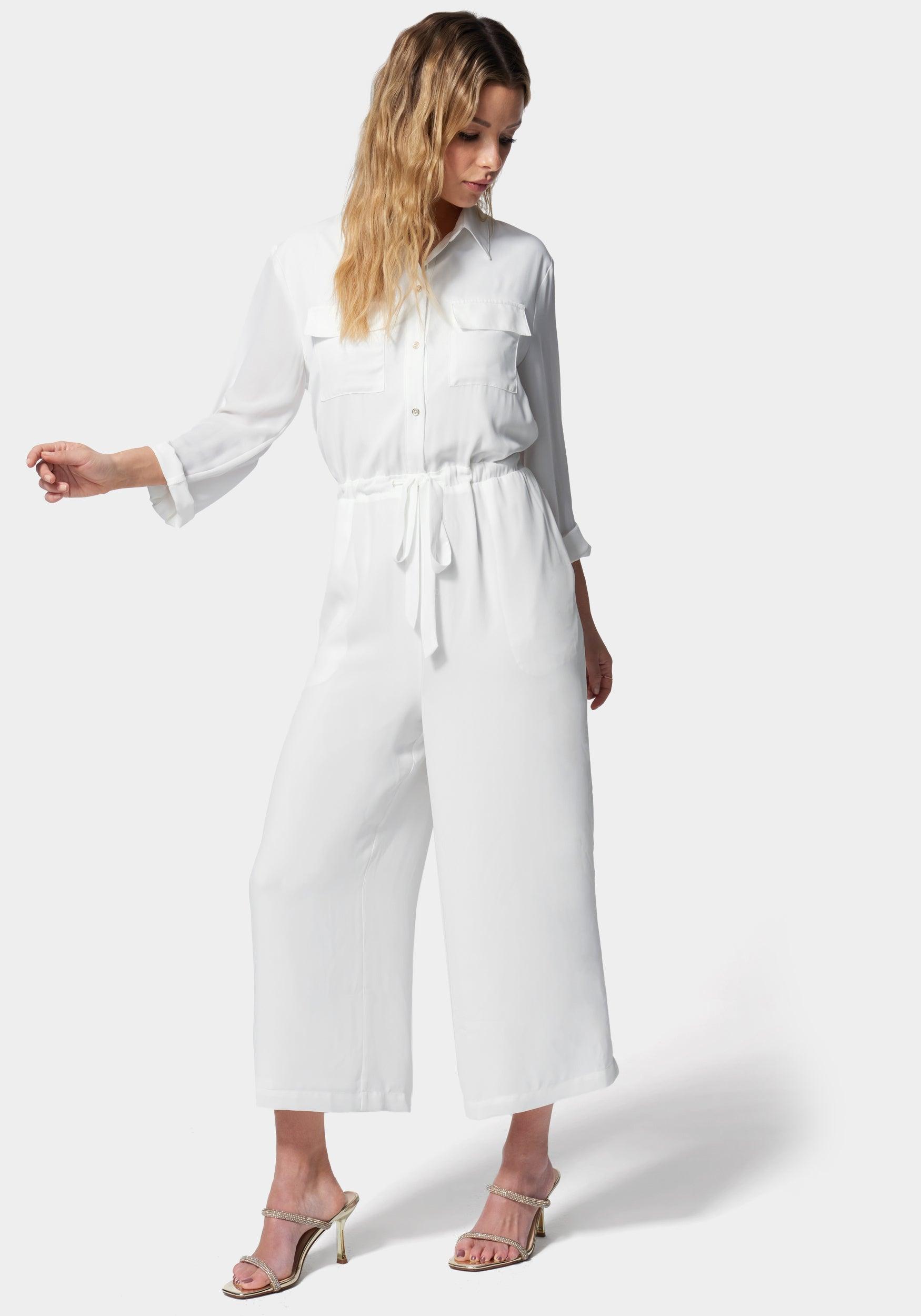 https://cdna.lystit.com/photos/bebe/1294bd93/bebe-Coconut-Milk-Utility-Pocket-Culotte-Jumpsuit.jpeg