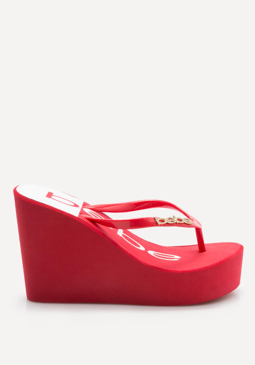Bebe Synthetic Raaven Wedge Flip Flops in Red/White (Red) - Lyst
