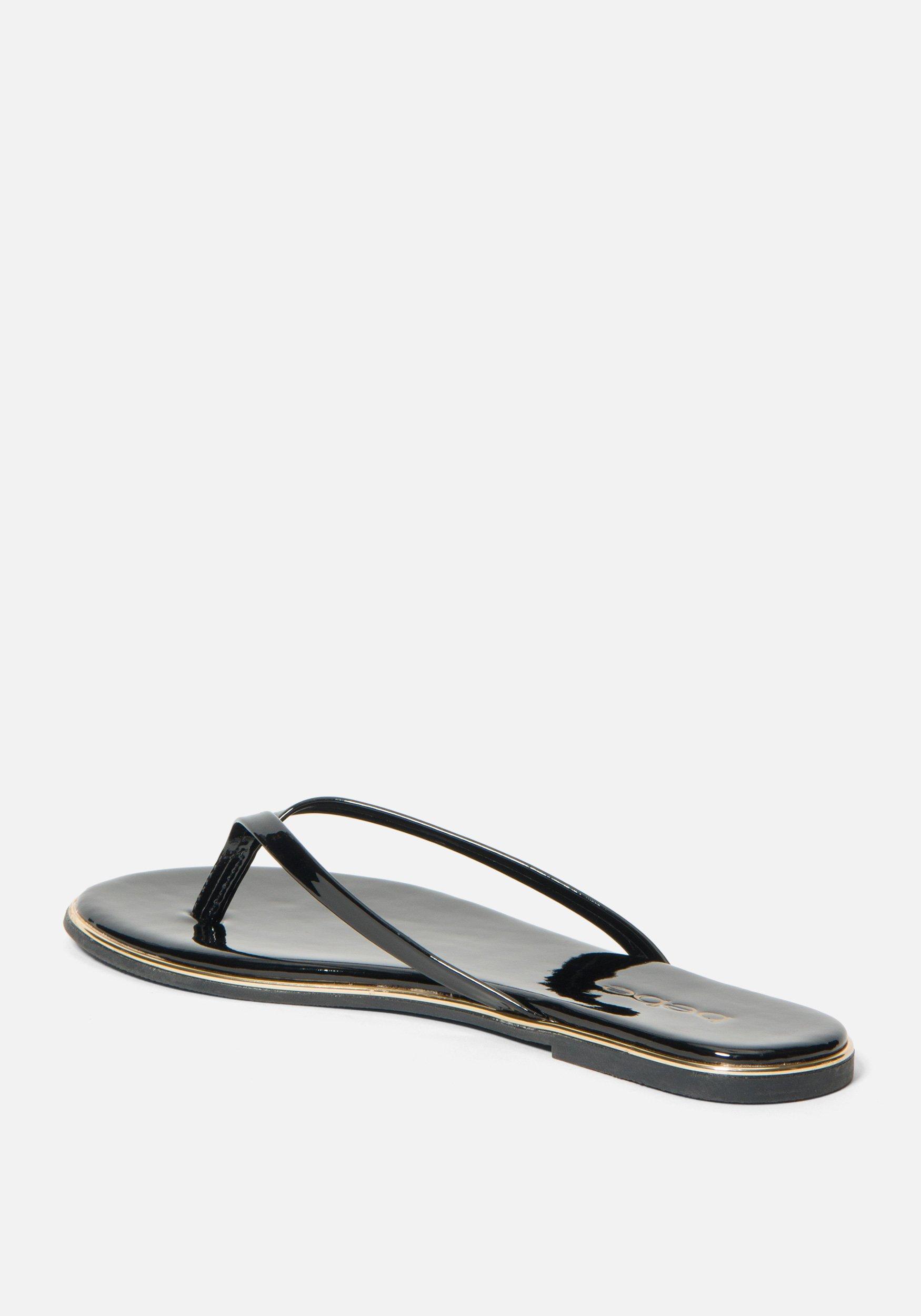 Bebe Synthetic Ilistra Flip Flops in Black - Lyst