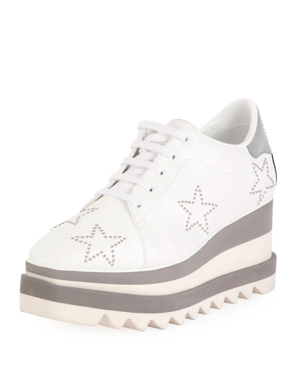 white platform sneakers with stars