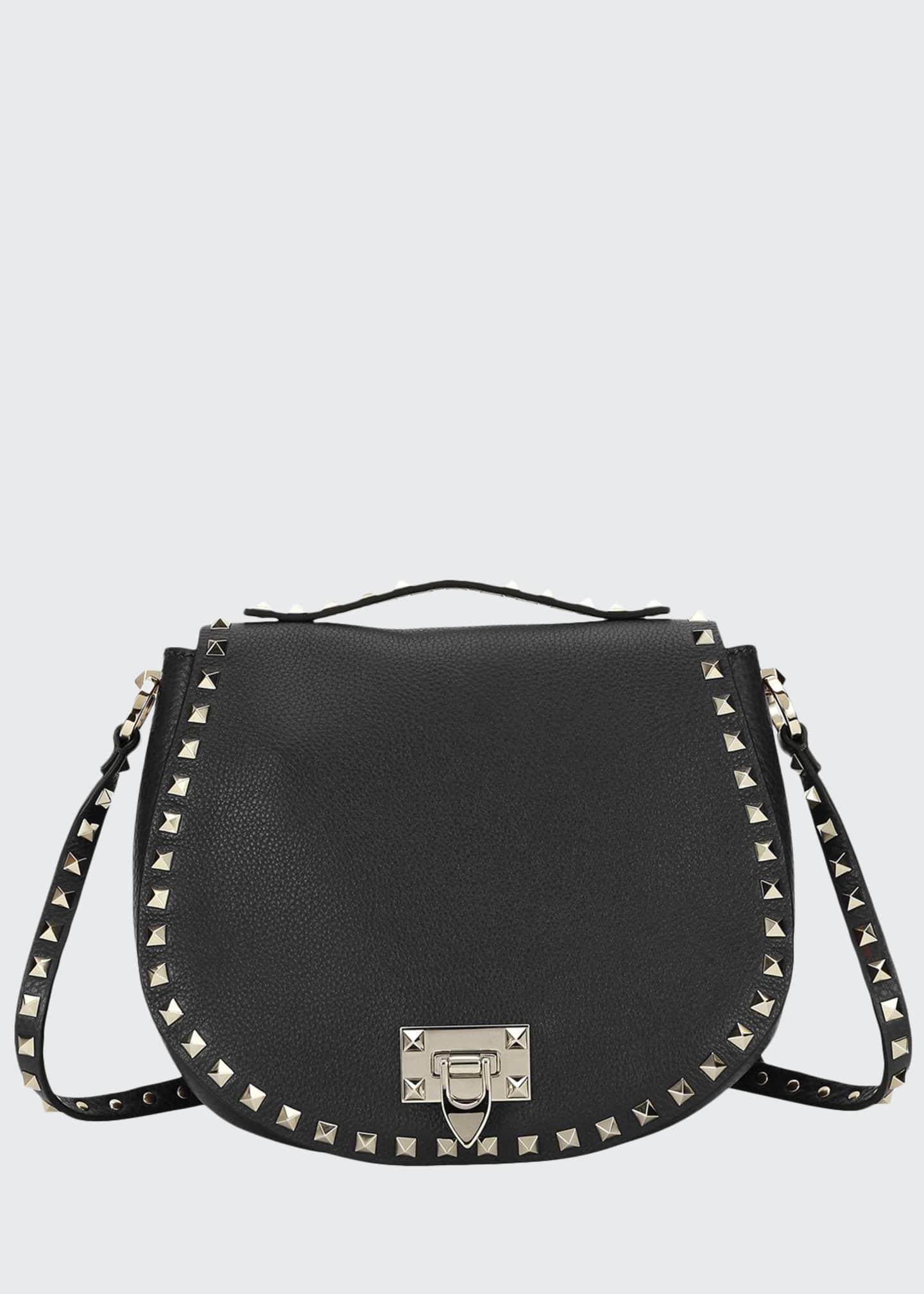 Valentino Garavani Leather Rockstud Small Saddle Crossbody Bag in Brown