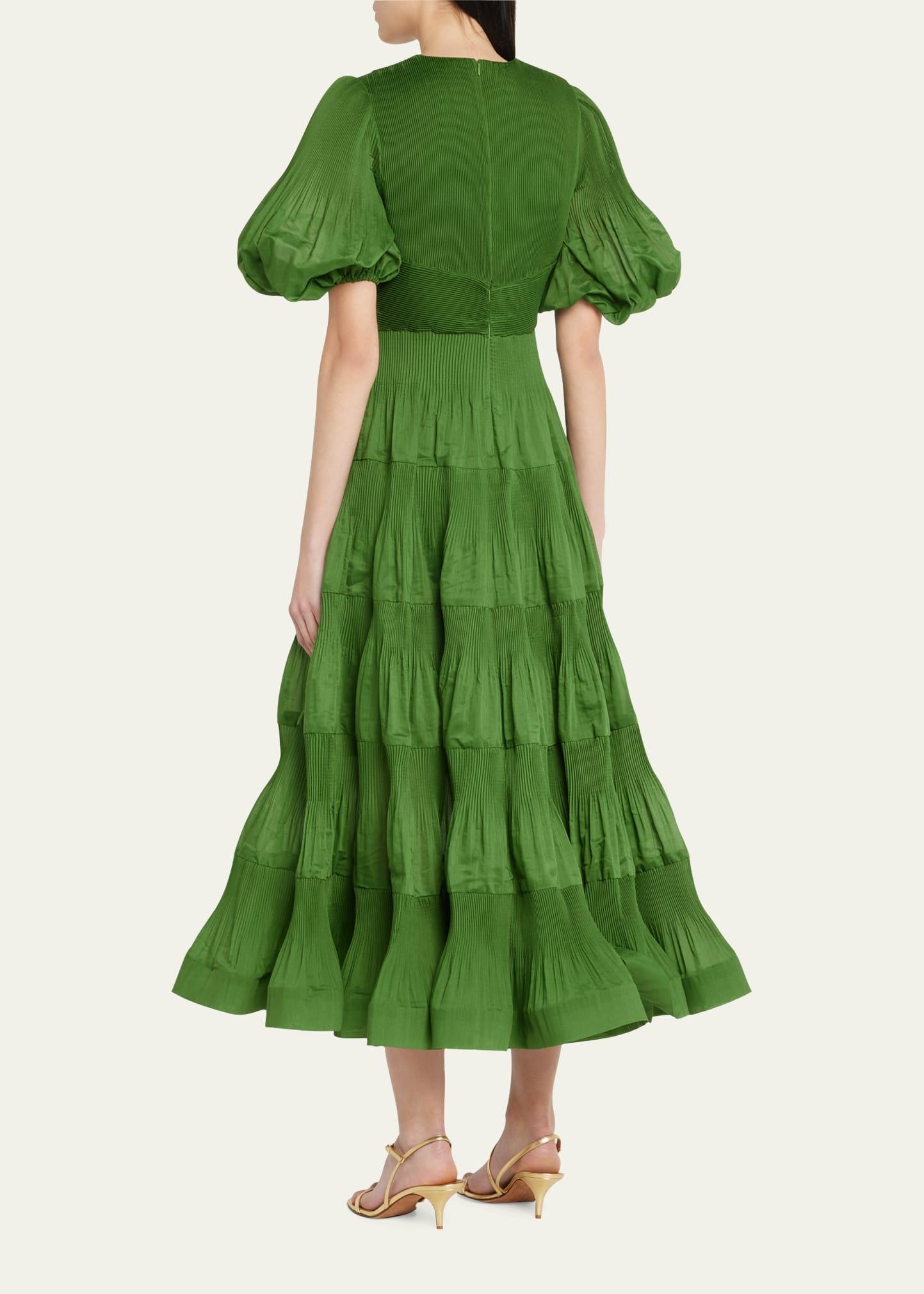 zimmermann pleated midi dress green Coming soon.... ZIMMERMANN Pleated midi dress Size 1 Sculptural but effortless, you'll find yourself reaching for this green midi dress from Zimmerman for myriad occasions. Made from a lightweight, pleated fabric, the