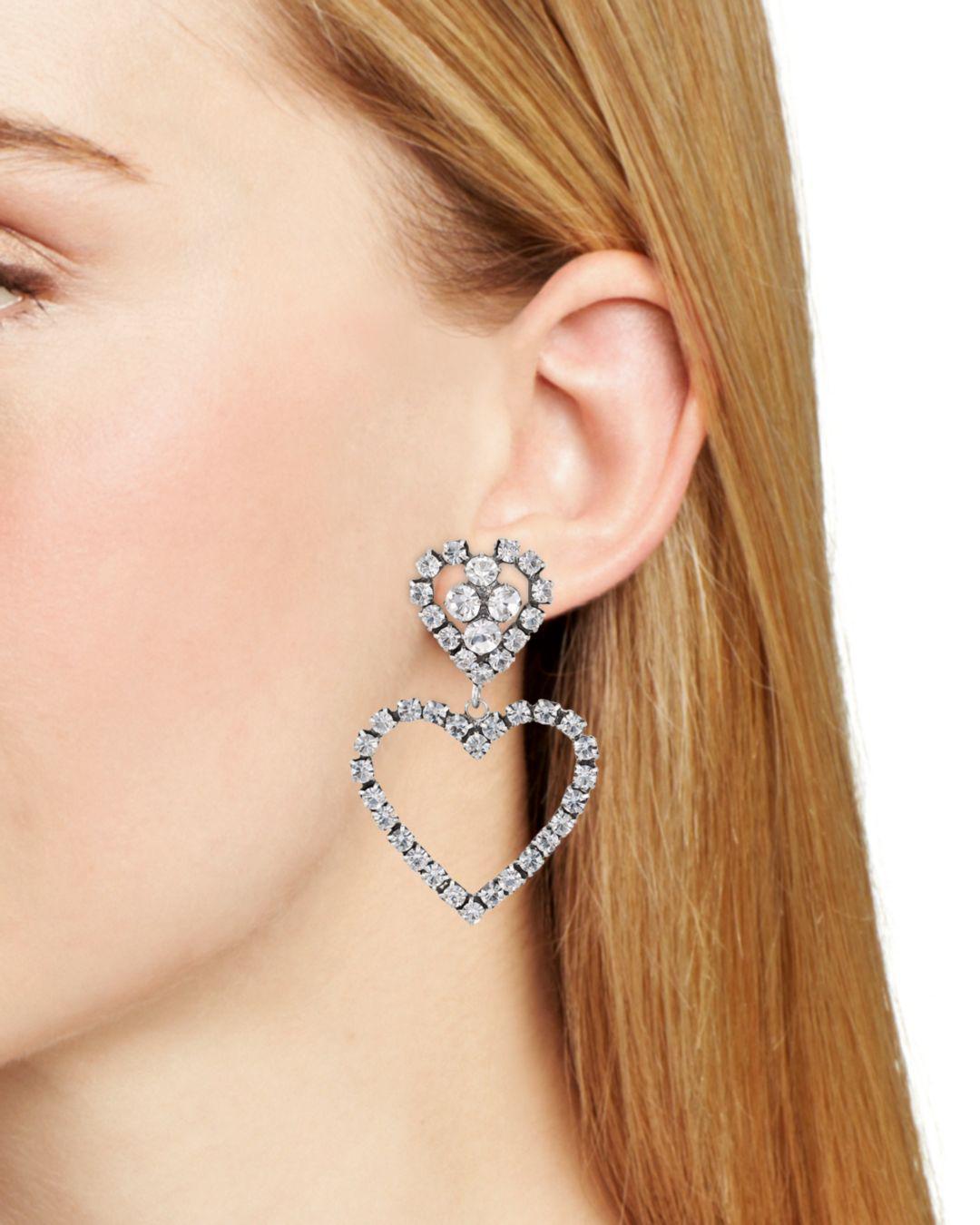 DANNIJO Lola Pavé Heart Drop Earrings in Metallic | Lyst