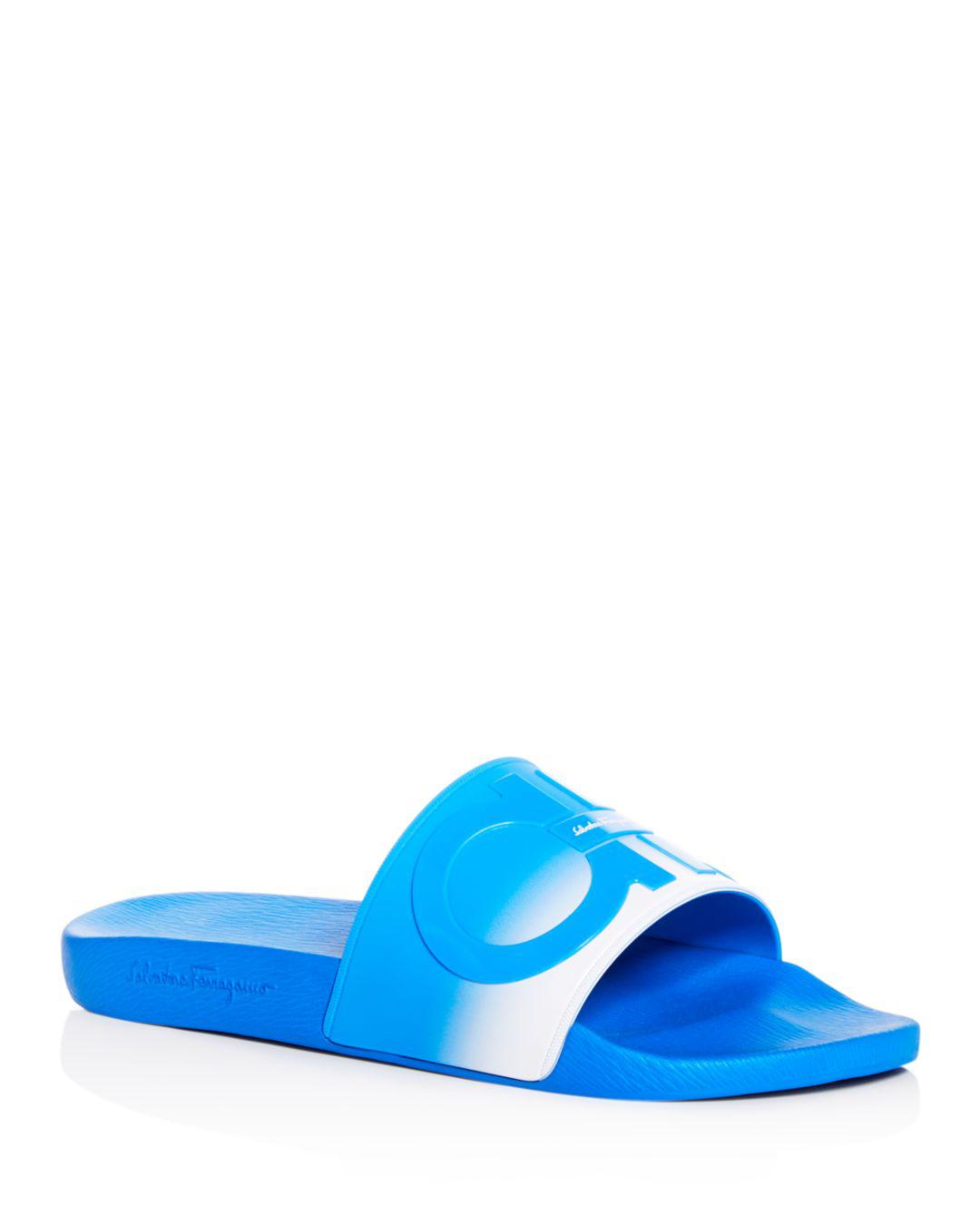 white ferragamo slides