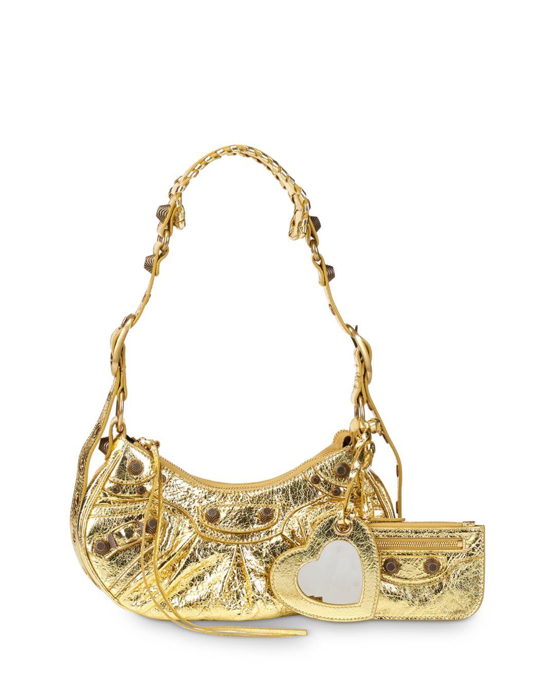 Balenciaga Leather Le Cagole Xs Shoulder Bag in Gold/Gold (Metallic) | Lyst