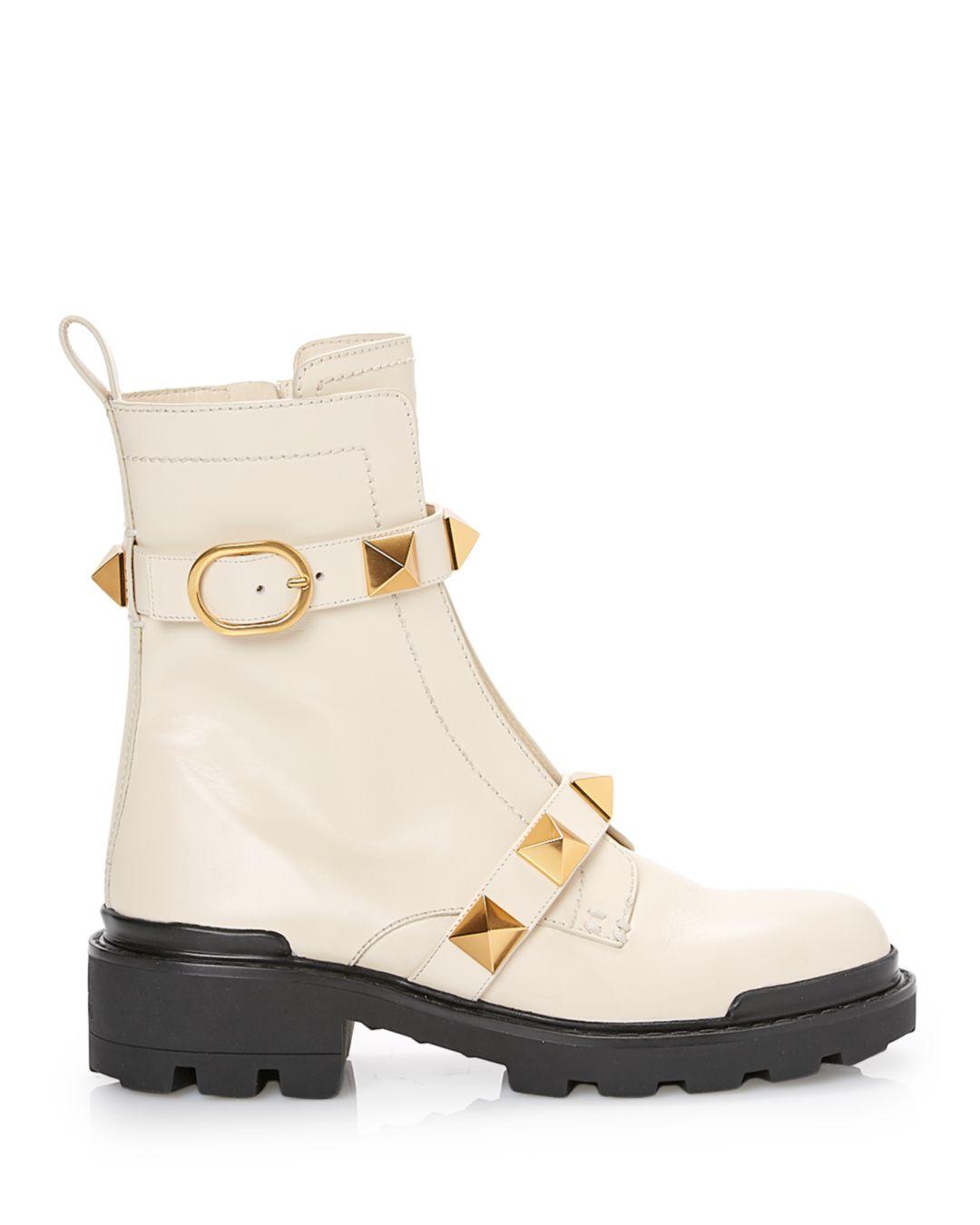 white boots with studs