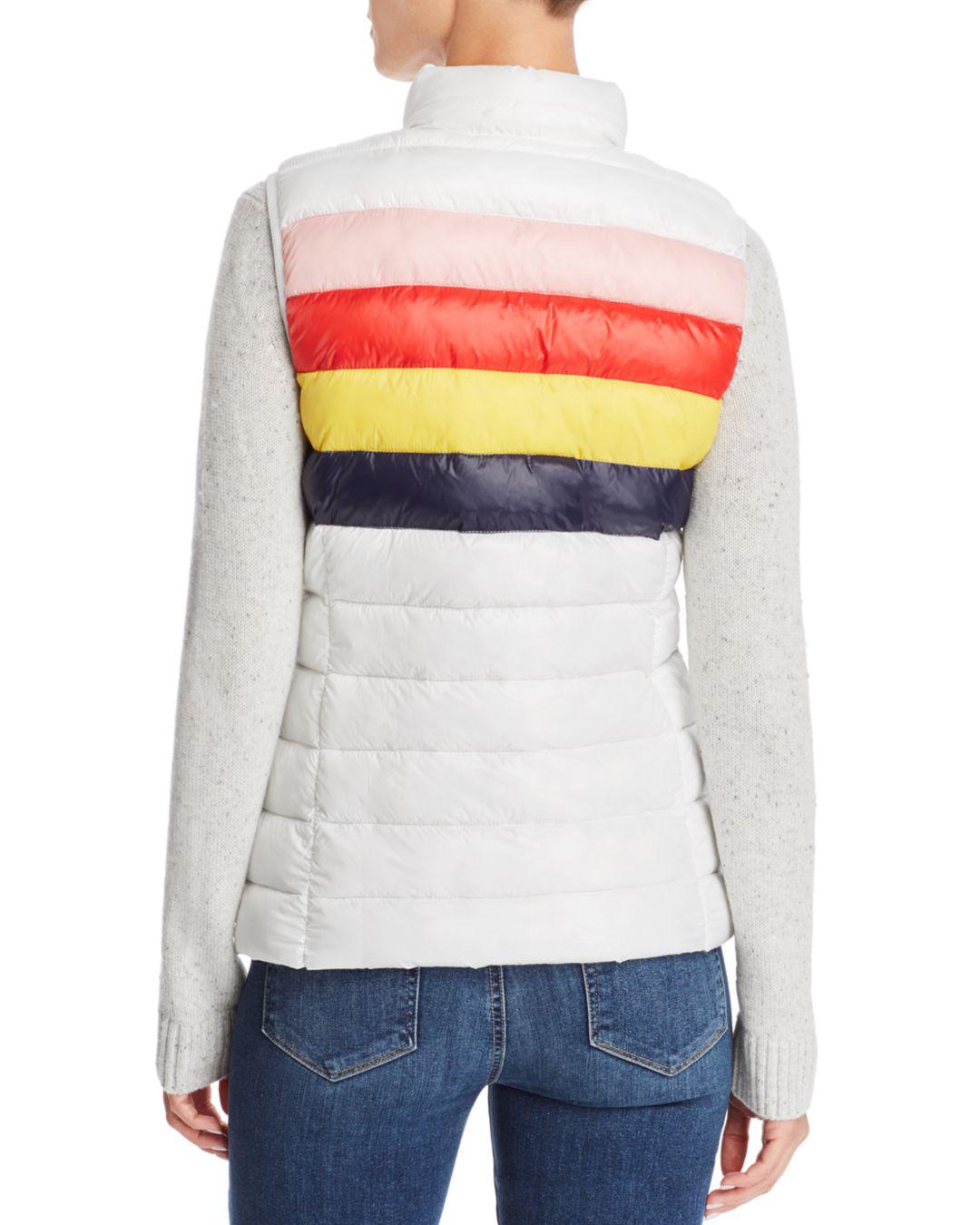 white jacket with rainbow stripes