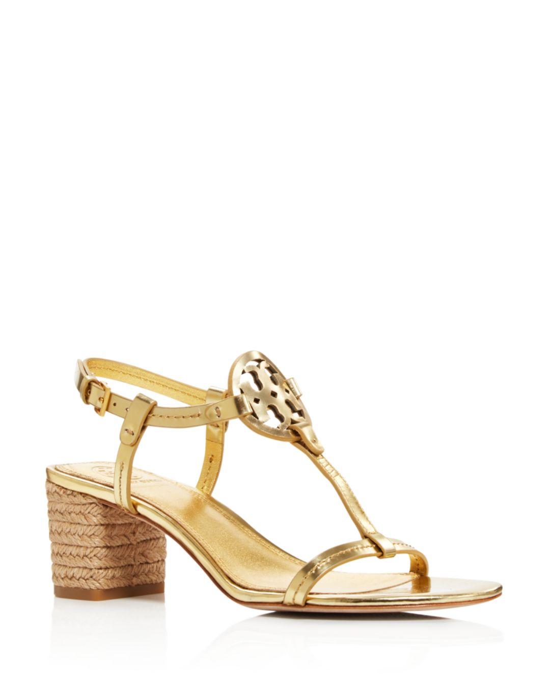 tory burch black and gold heels