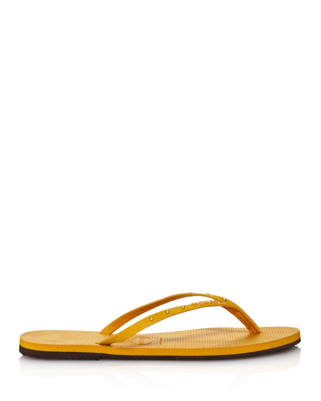 mustard flip flops