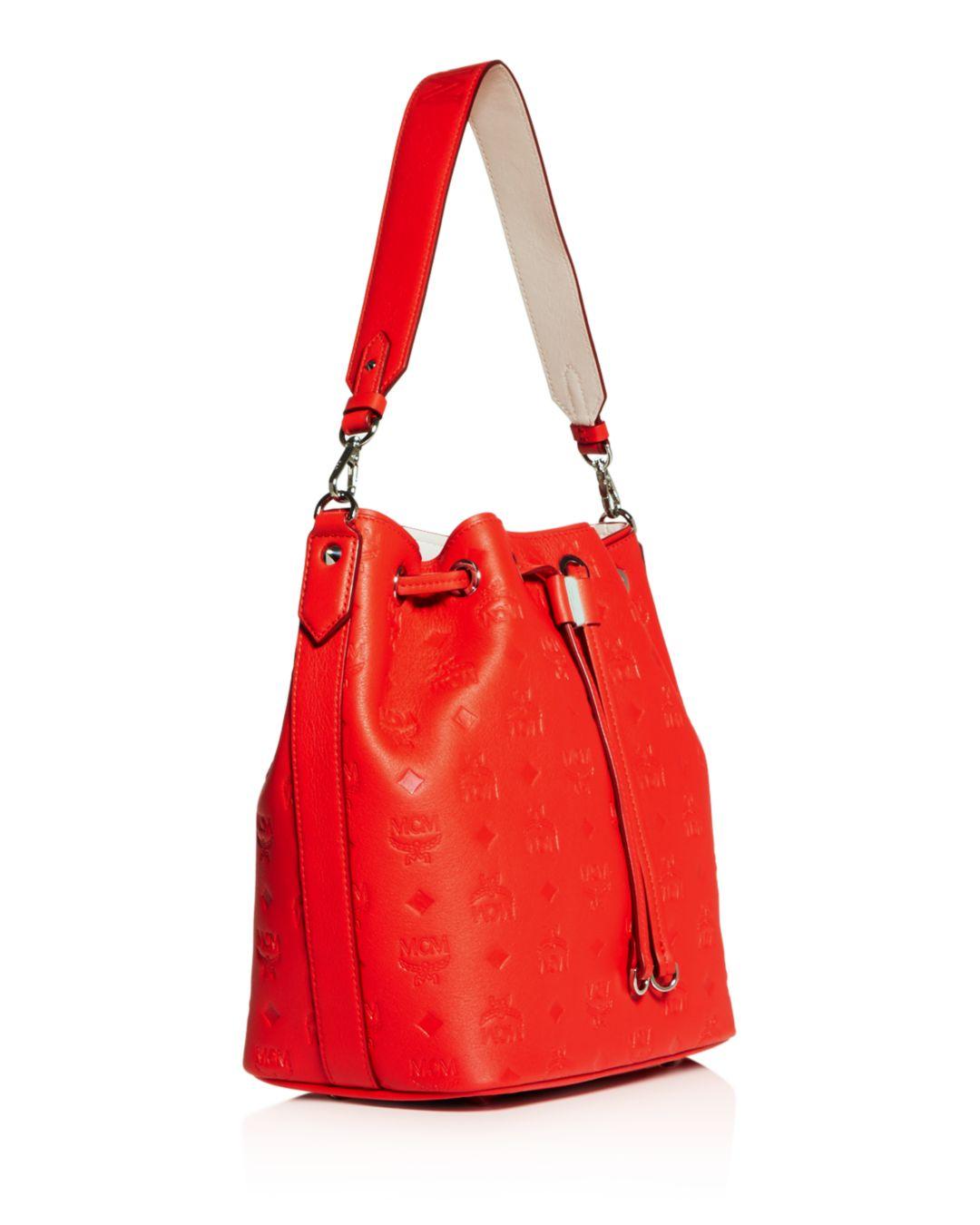 MCM Essential Embossed Leather Bucket Bag in Red | Lyst