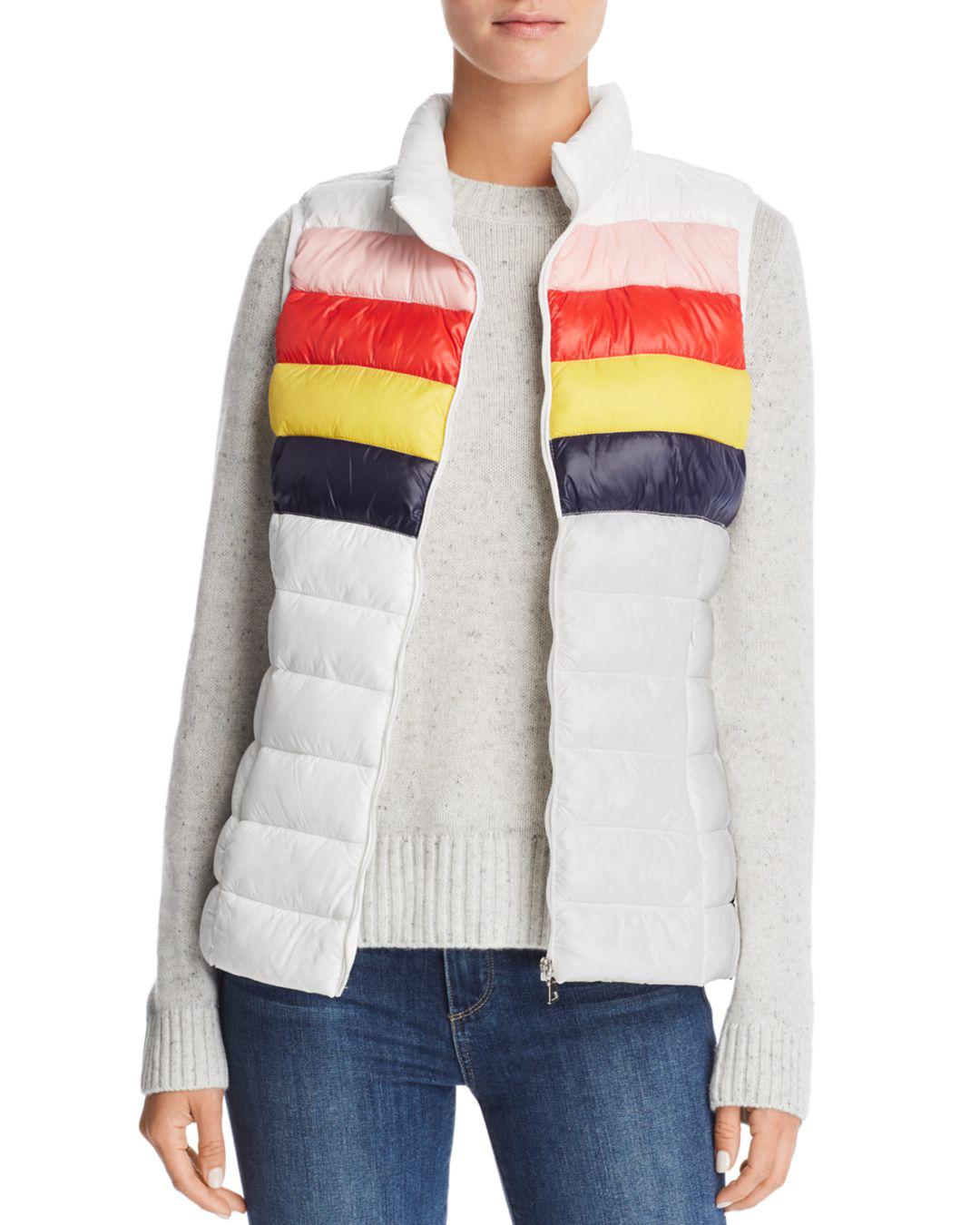 white jacket with rainbow stripes