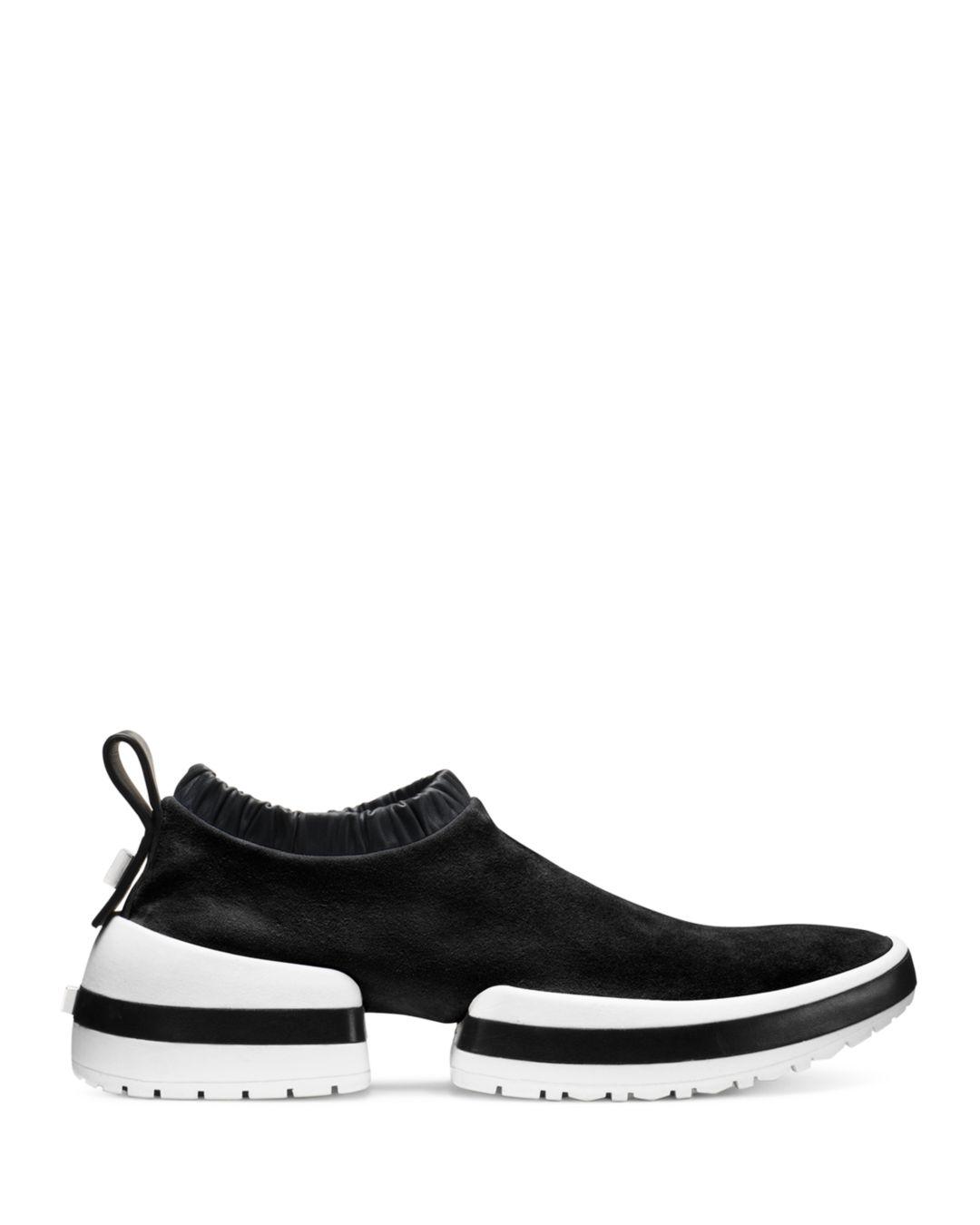 stuart weitzman slip on sneakers
