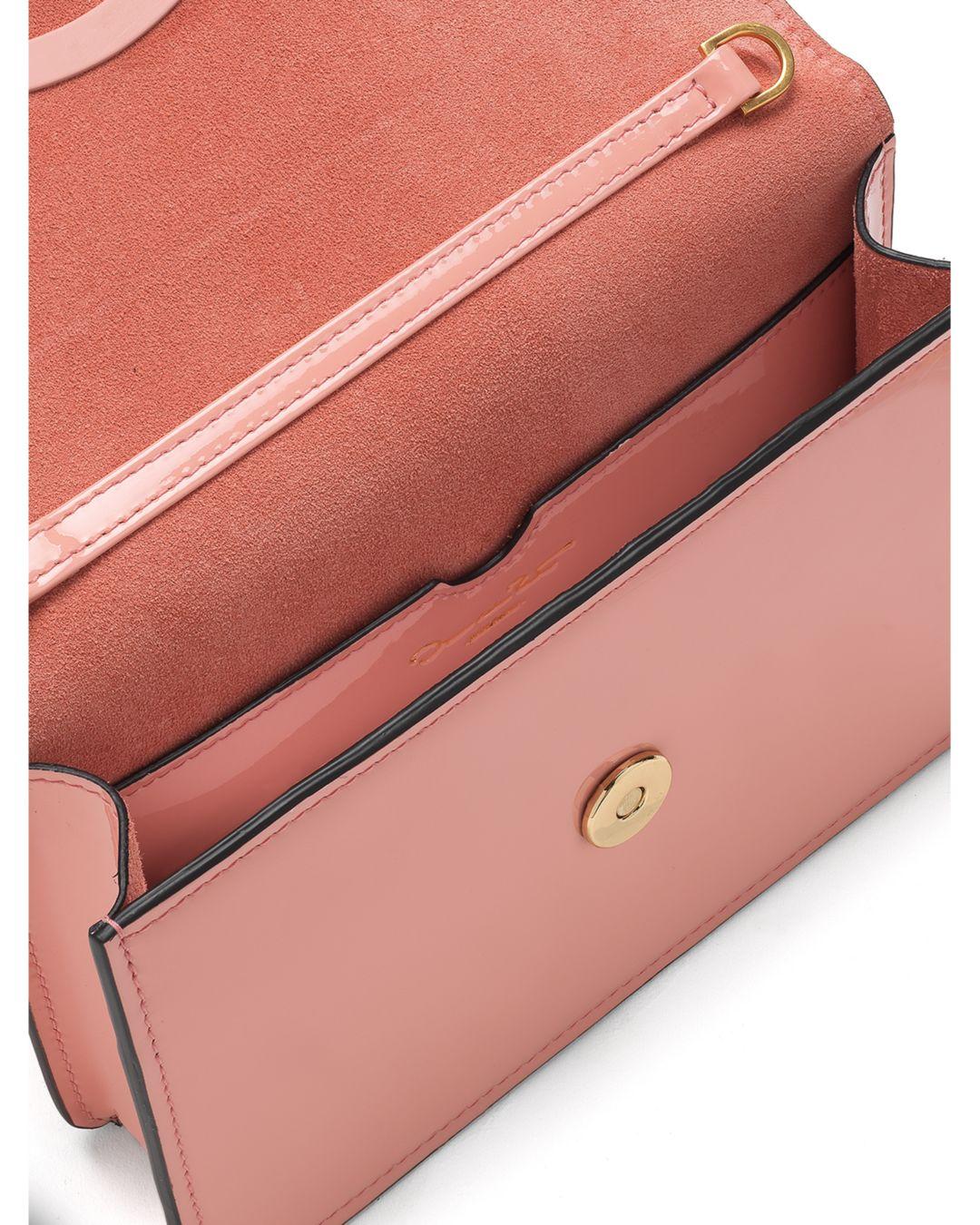 Prada Saffiano Mini Crossbody Clutch Pink, $1,390, Neiman Marcus