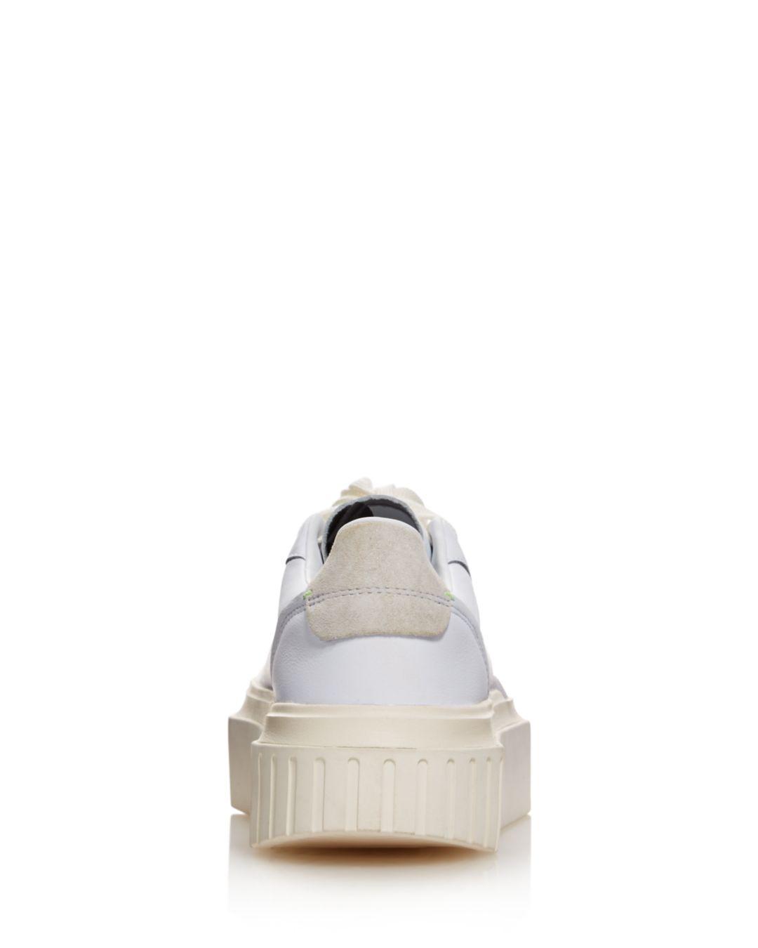 pointed platform sneakers