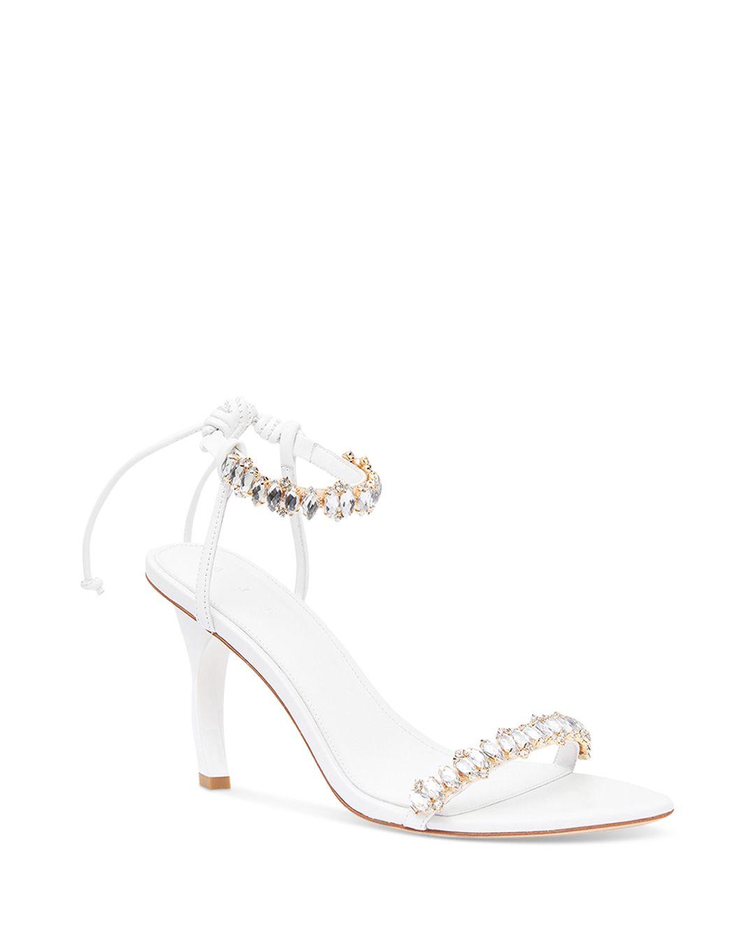 Aje. Jewel Embellished Ankle Strap Sculpted High Heel Sandals in White ...