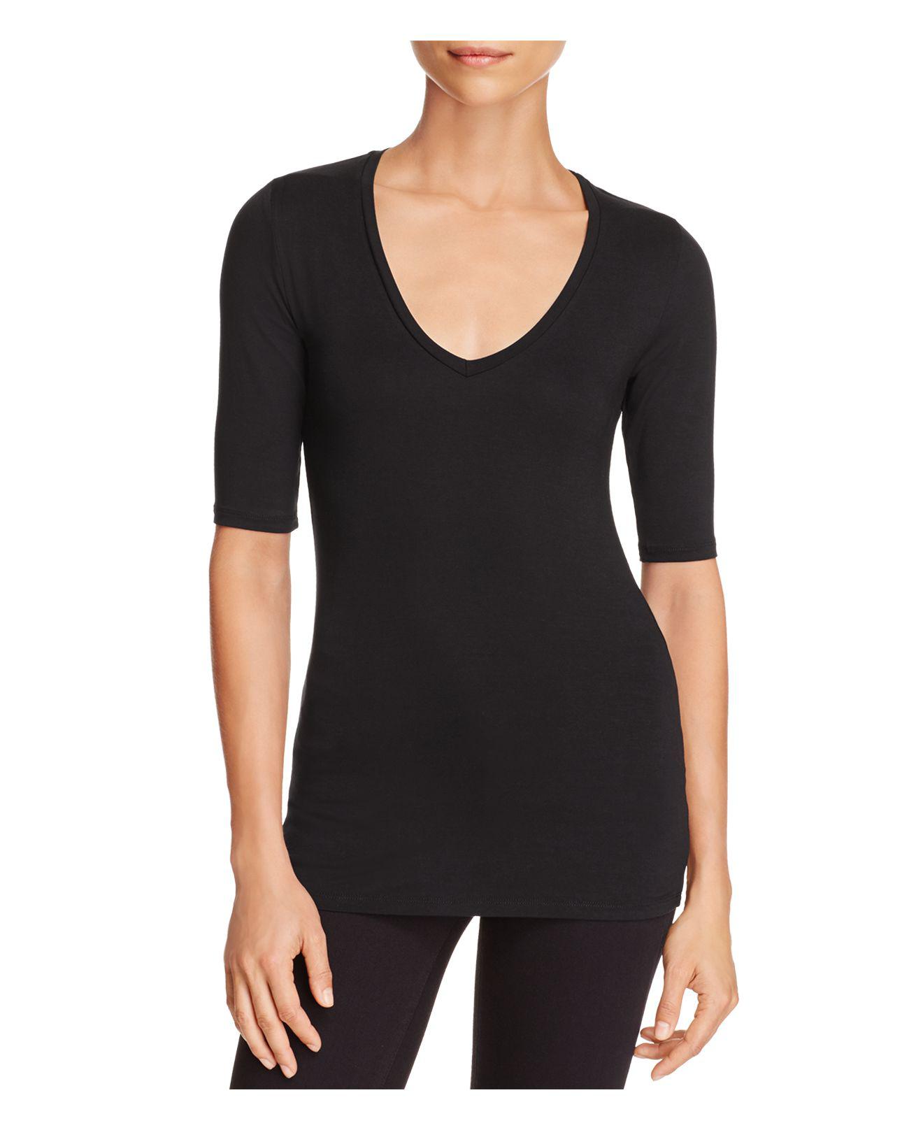 black shirt with elbow patch