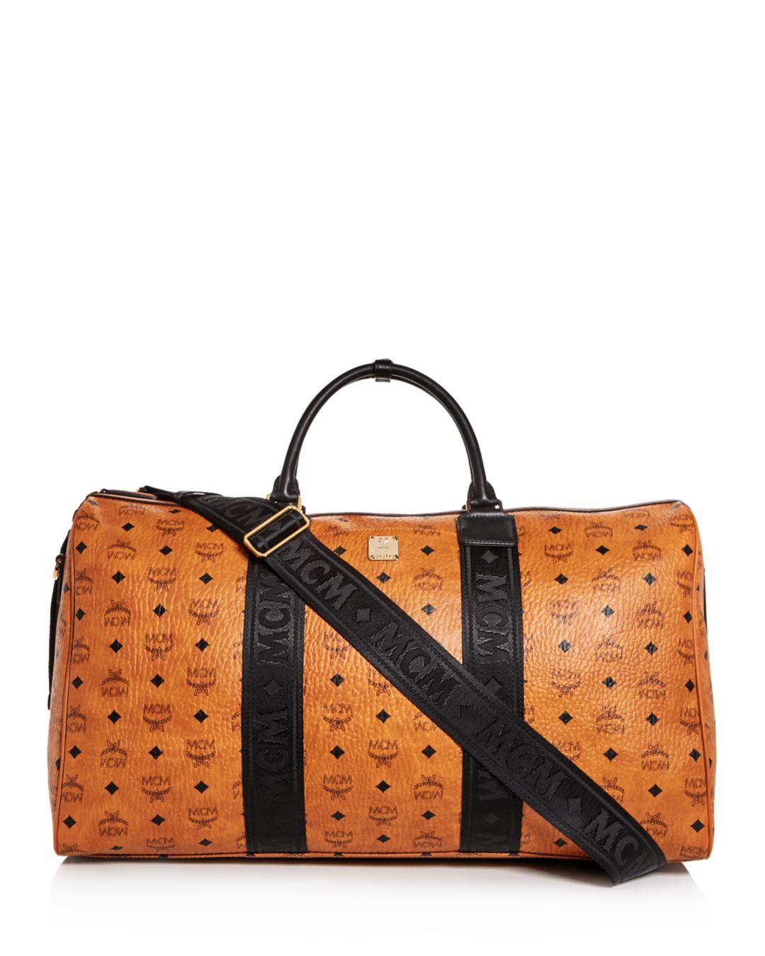 MCM Visetos Traveler Weekender Duffel Bag for Men - Lyst