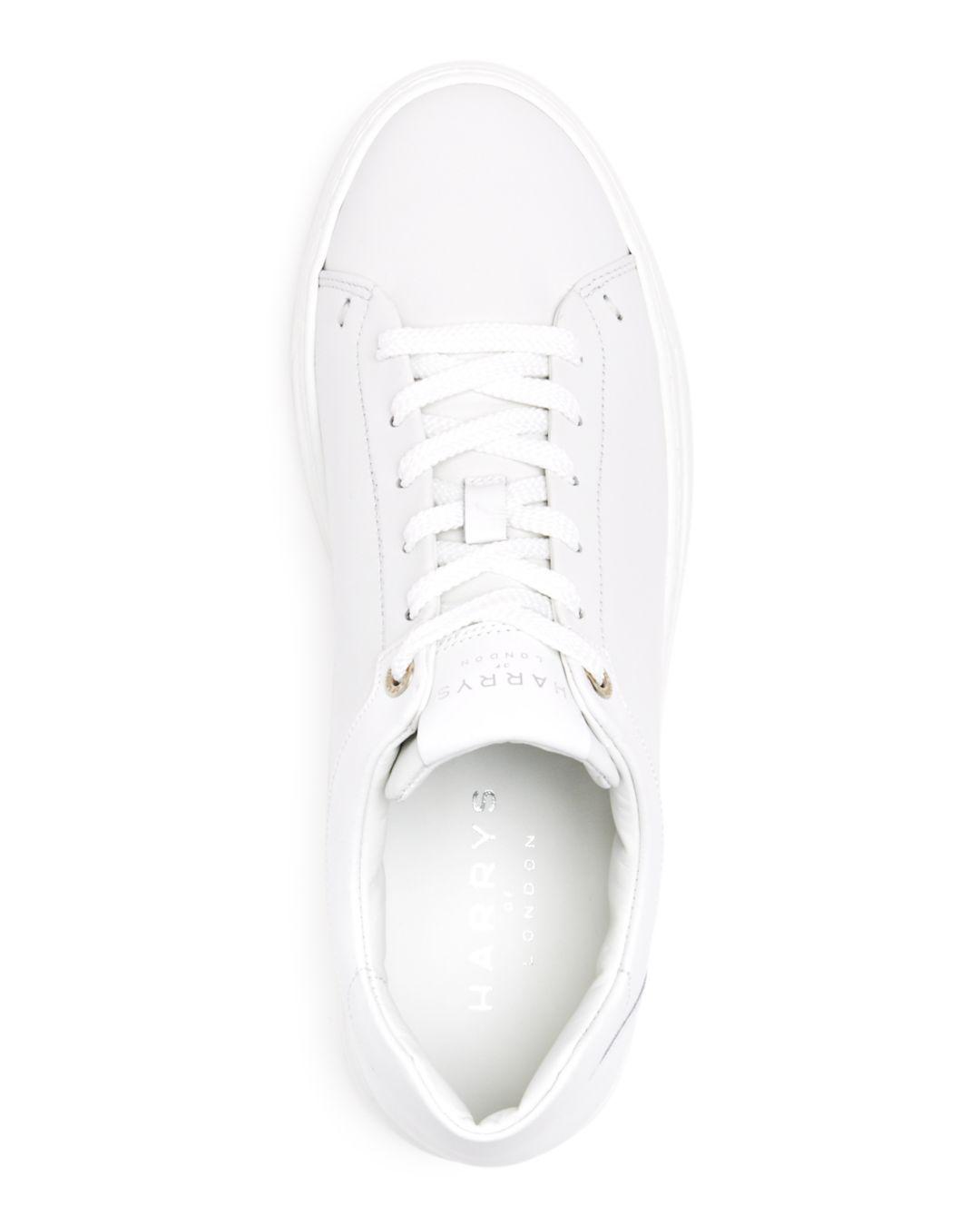 white leather lace up sneakers