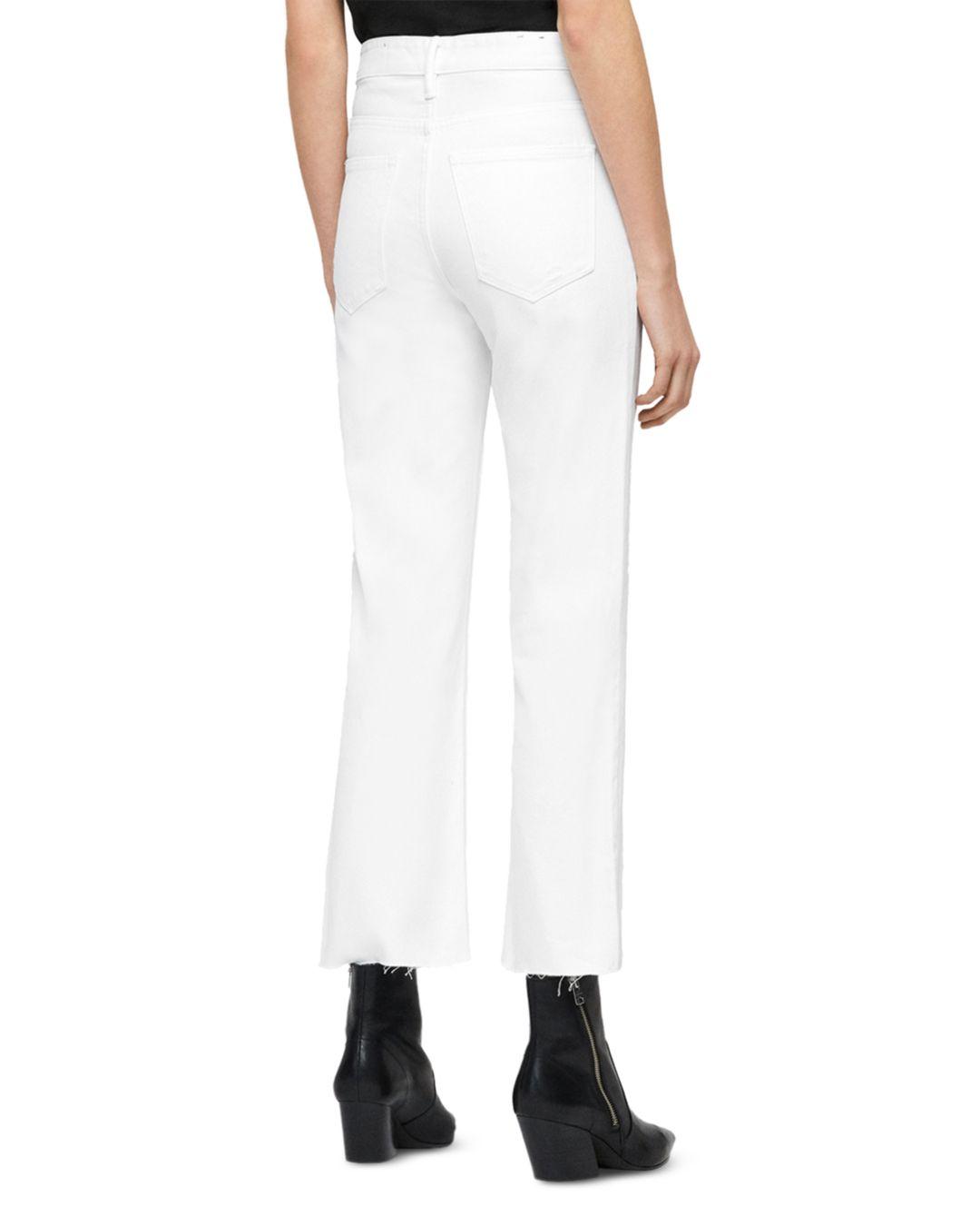 white cropped bootcut jeans
