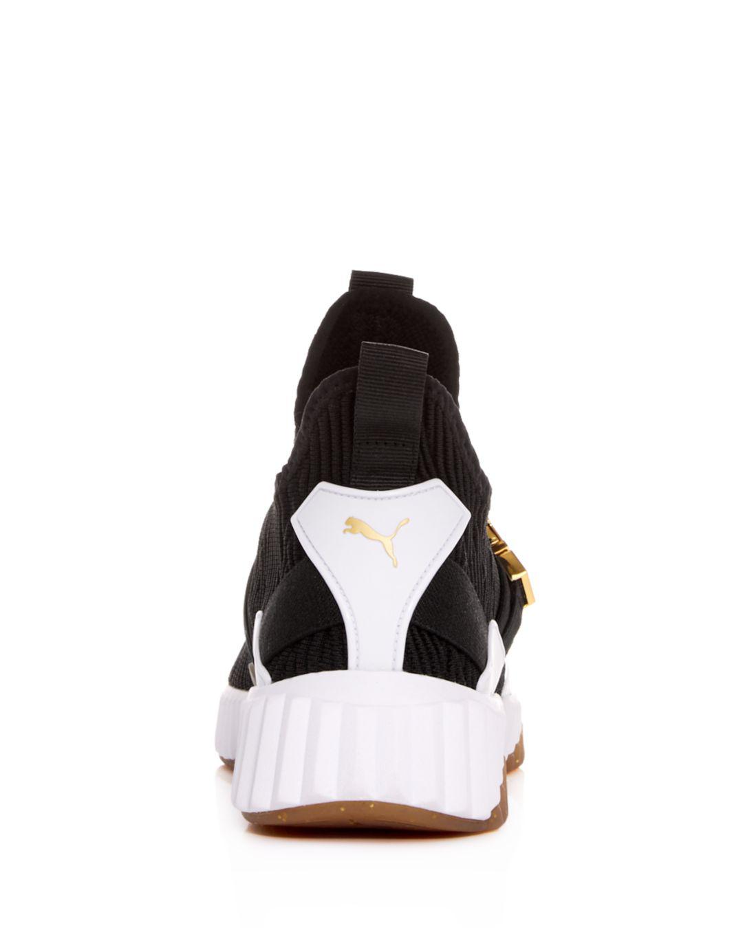 puma defy varsity white