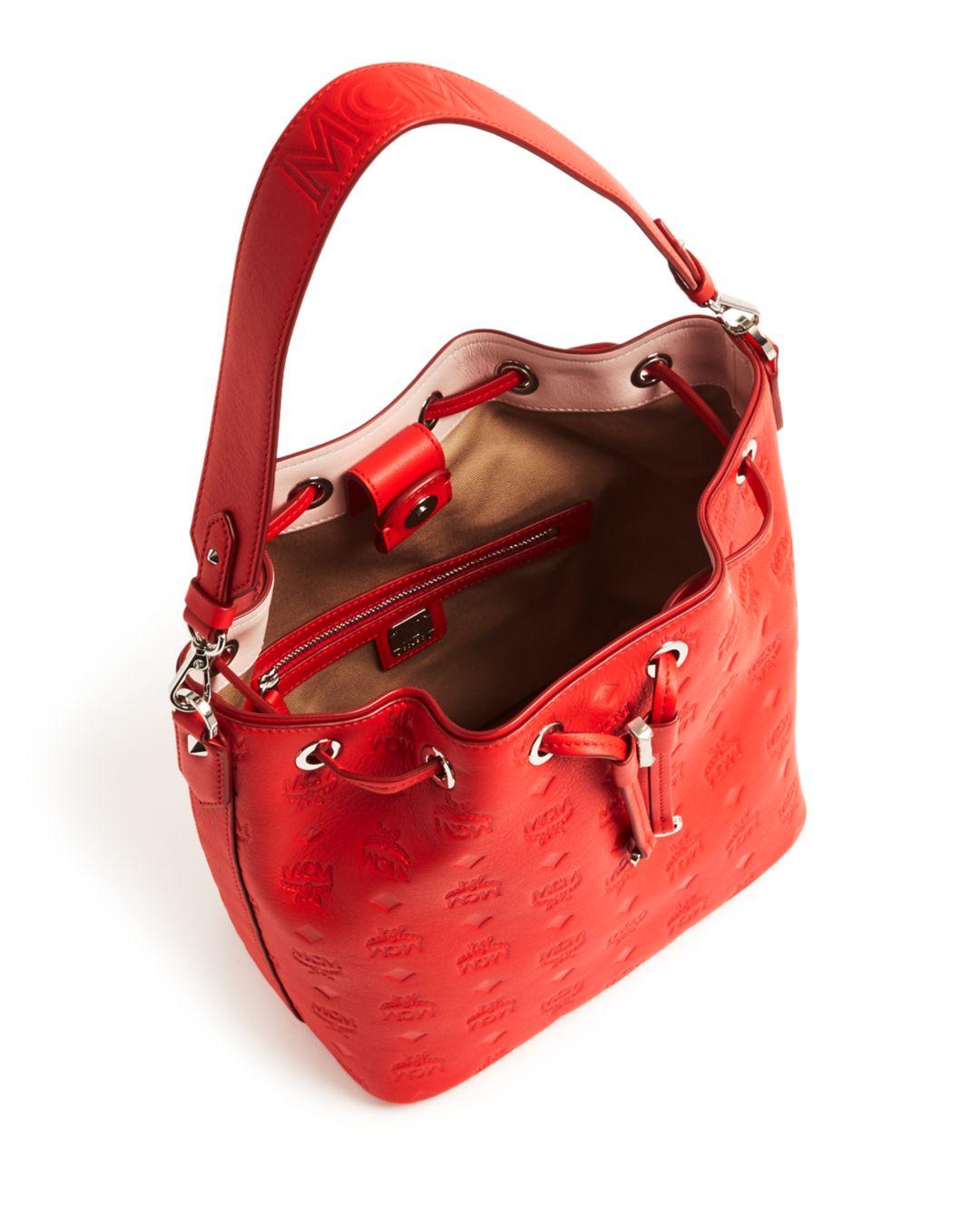 Mcm essential embossed leather bucket bag new arrivals