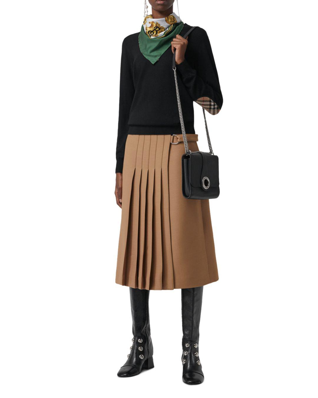 black sweater with elbow patches