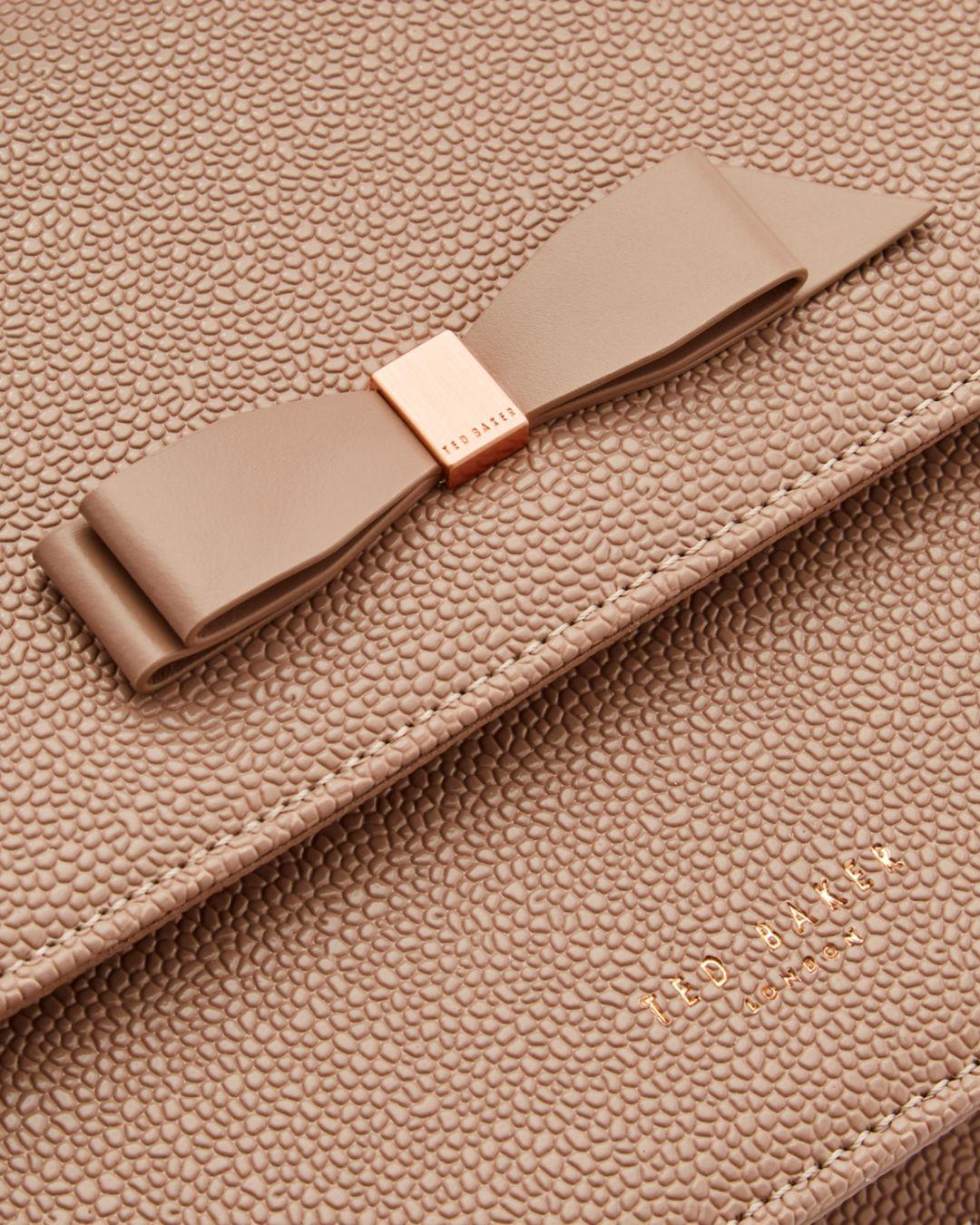 joanaa bow detail leather cross body bag