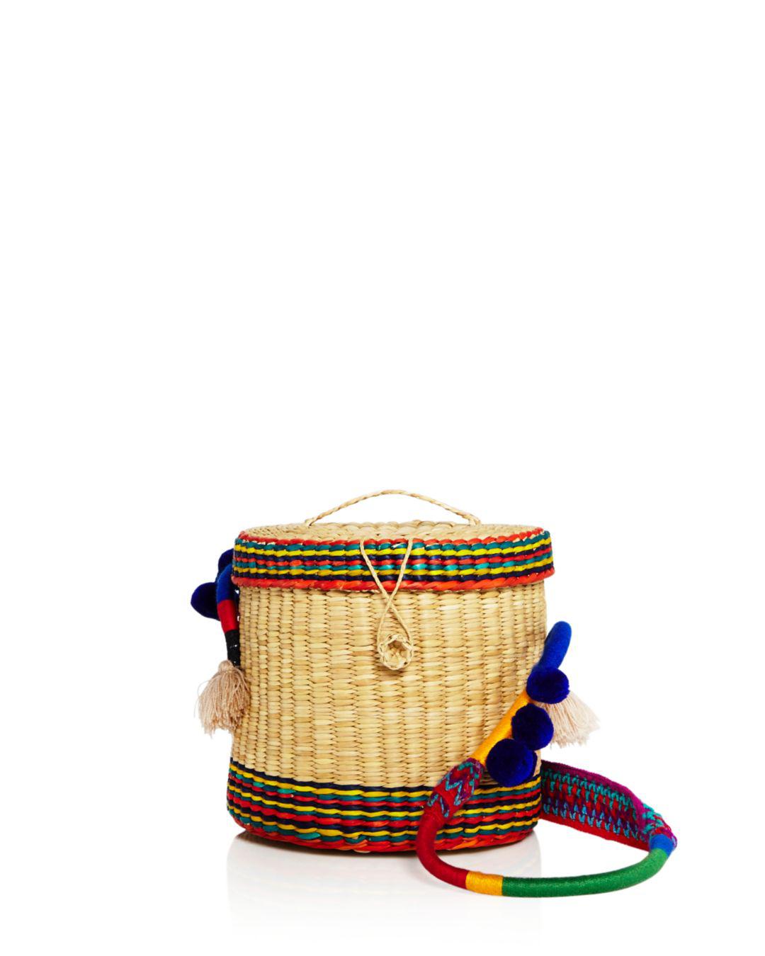 Lyst Nannacay Ana Striped Pom Straw Bucket Bag Nannacay Women S Ana Striped Pom Straw Bucket Bag