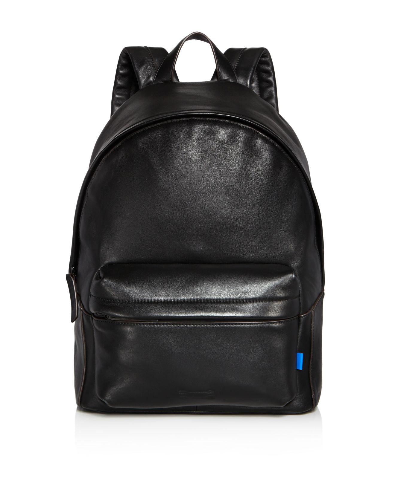 uri minkoff leather backpack