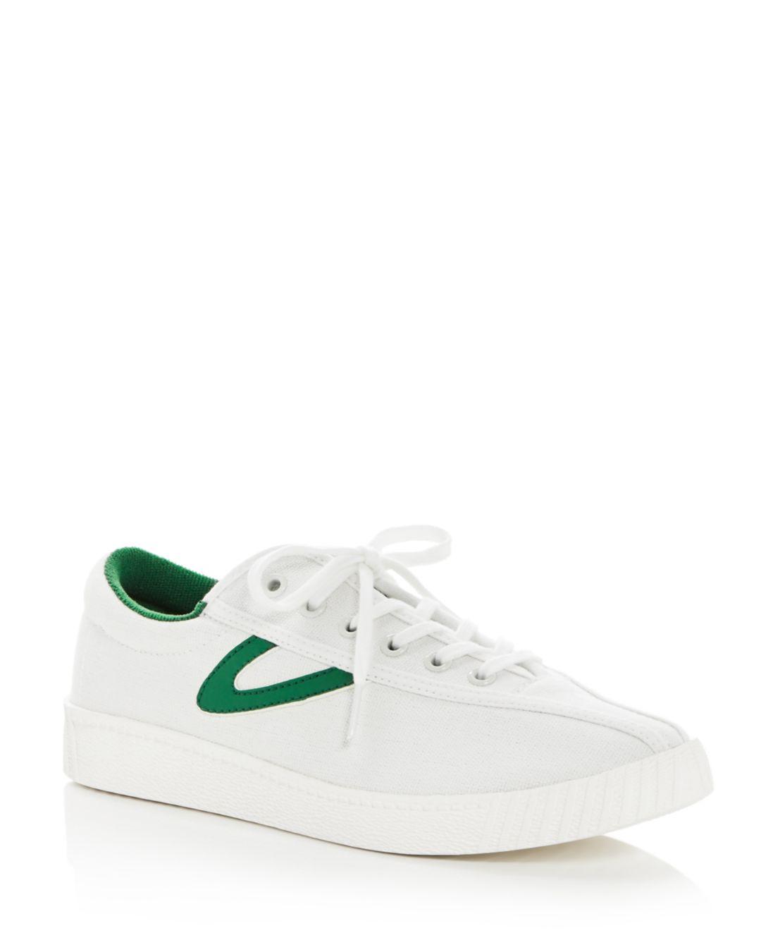 green and white tretorn
