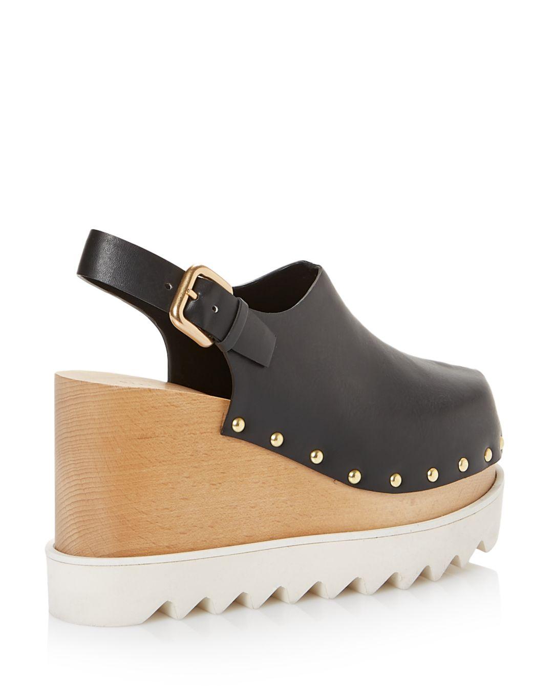 platform wedge clogs