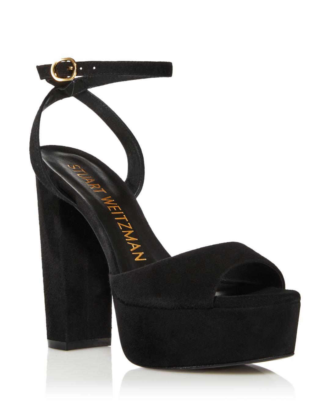 https://www.lyst.com/shoes/stuart-weitzman-ryder-ii-ankle-strap-platform-high-heel-sandals/