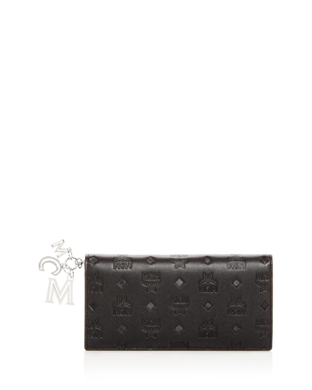 MCM Klara Logo Monogram Leather Continental Wallet in Black | Lyst