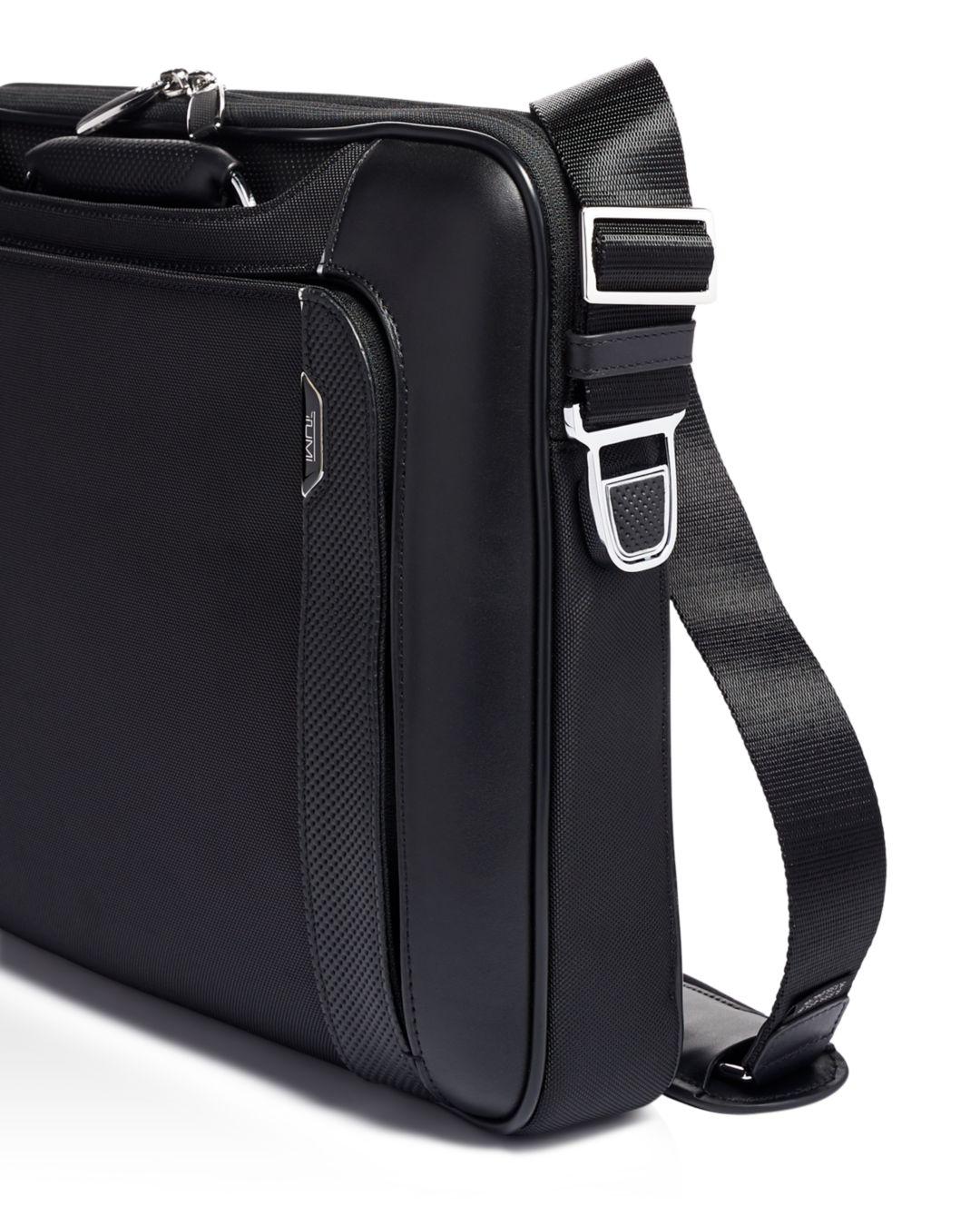 tumi satchel leather