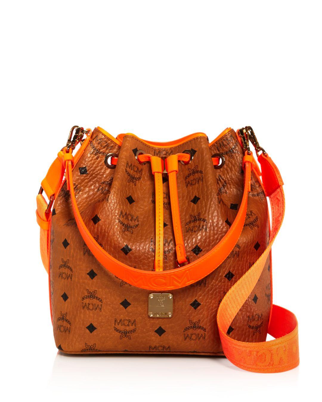 MCM Visetos Crossbody Bucket Bag in Cognac/Orange/Gold (Orange) | Lyst