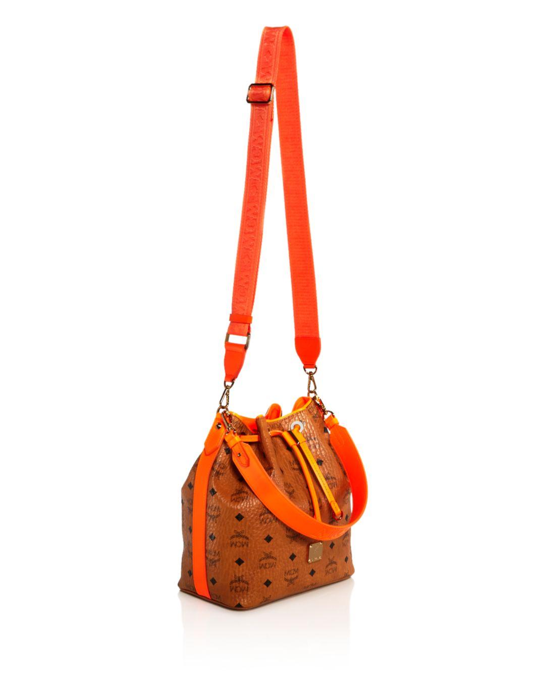 MCM Visetos Crossbody Bucket Bag in Cognac/Orange/Gold (Orange) | Lyst