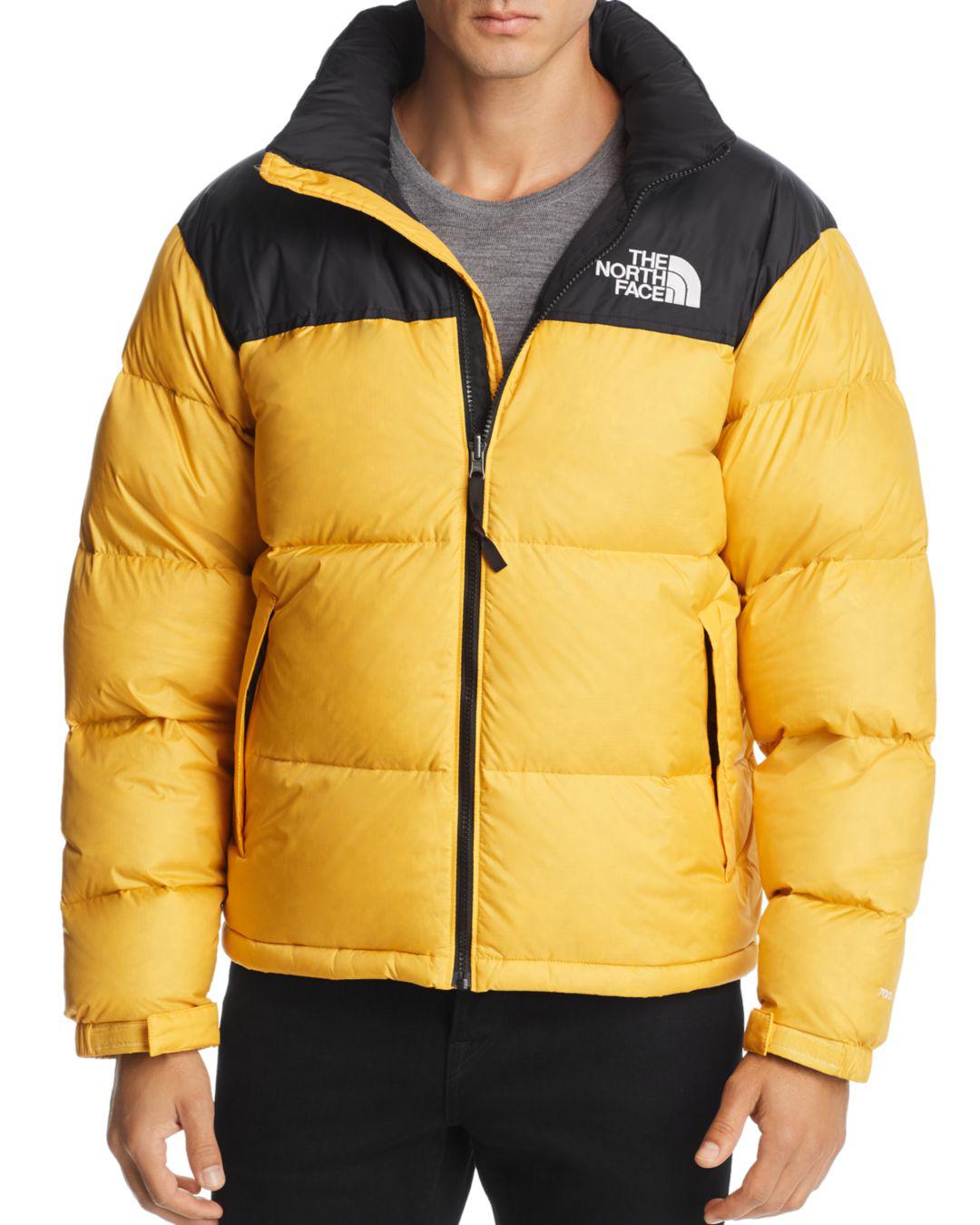 north face yellow down jacket