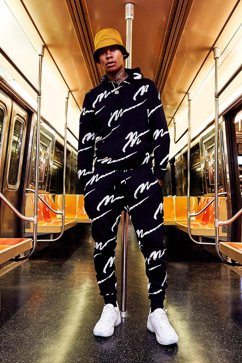 all over man printed hooded tracksuit black