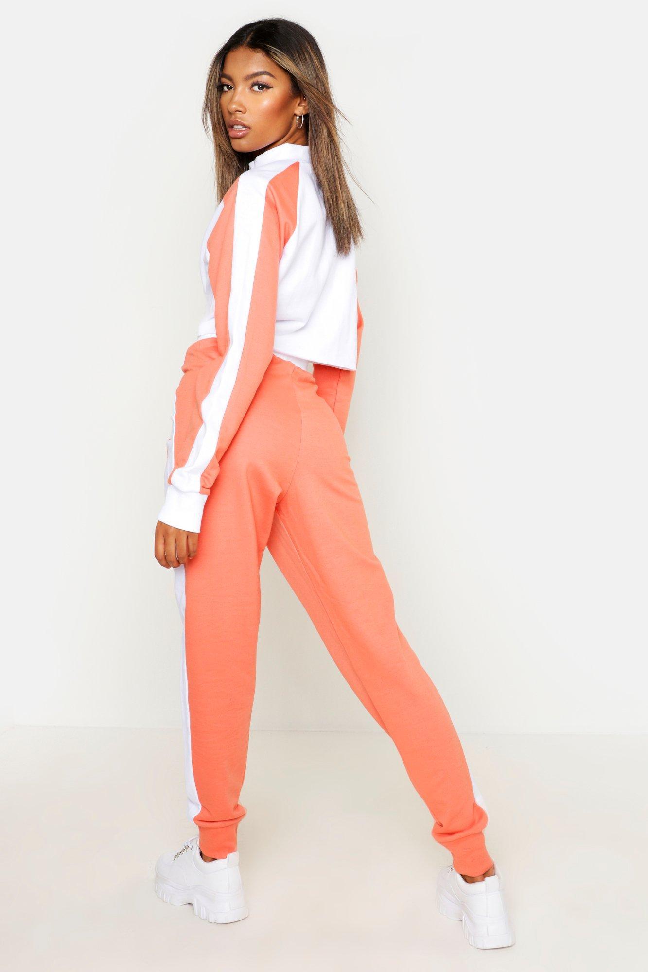 orange colour tracksuit