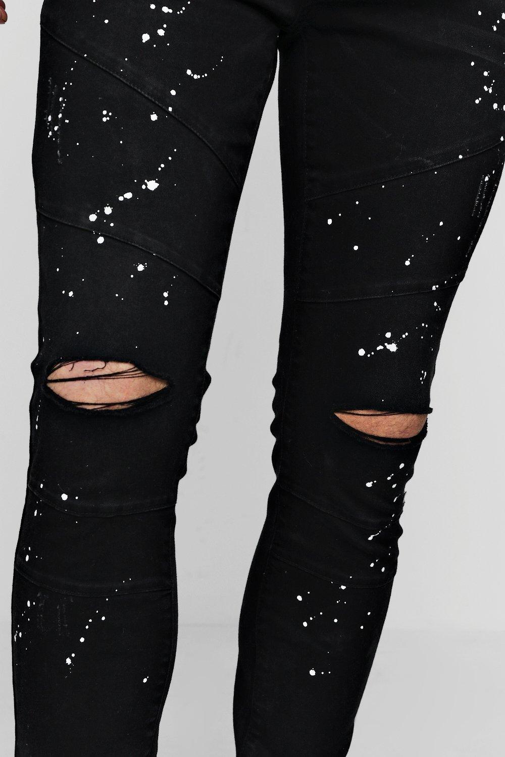 black jeans with pink paint splatter