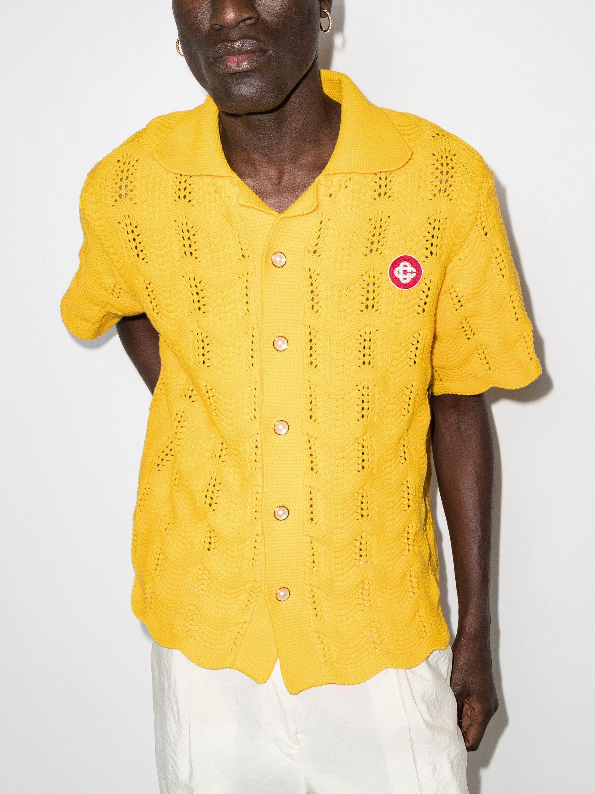 yellow knit polo