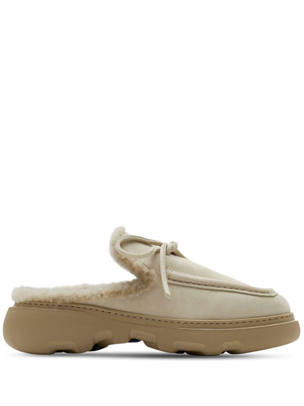 【Burberry】 Stony faux fur-lined suede mules Burberry Neutral Stony Shearling Mules in Natural | Lyst
