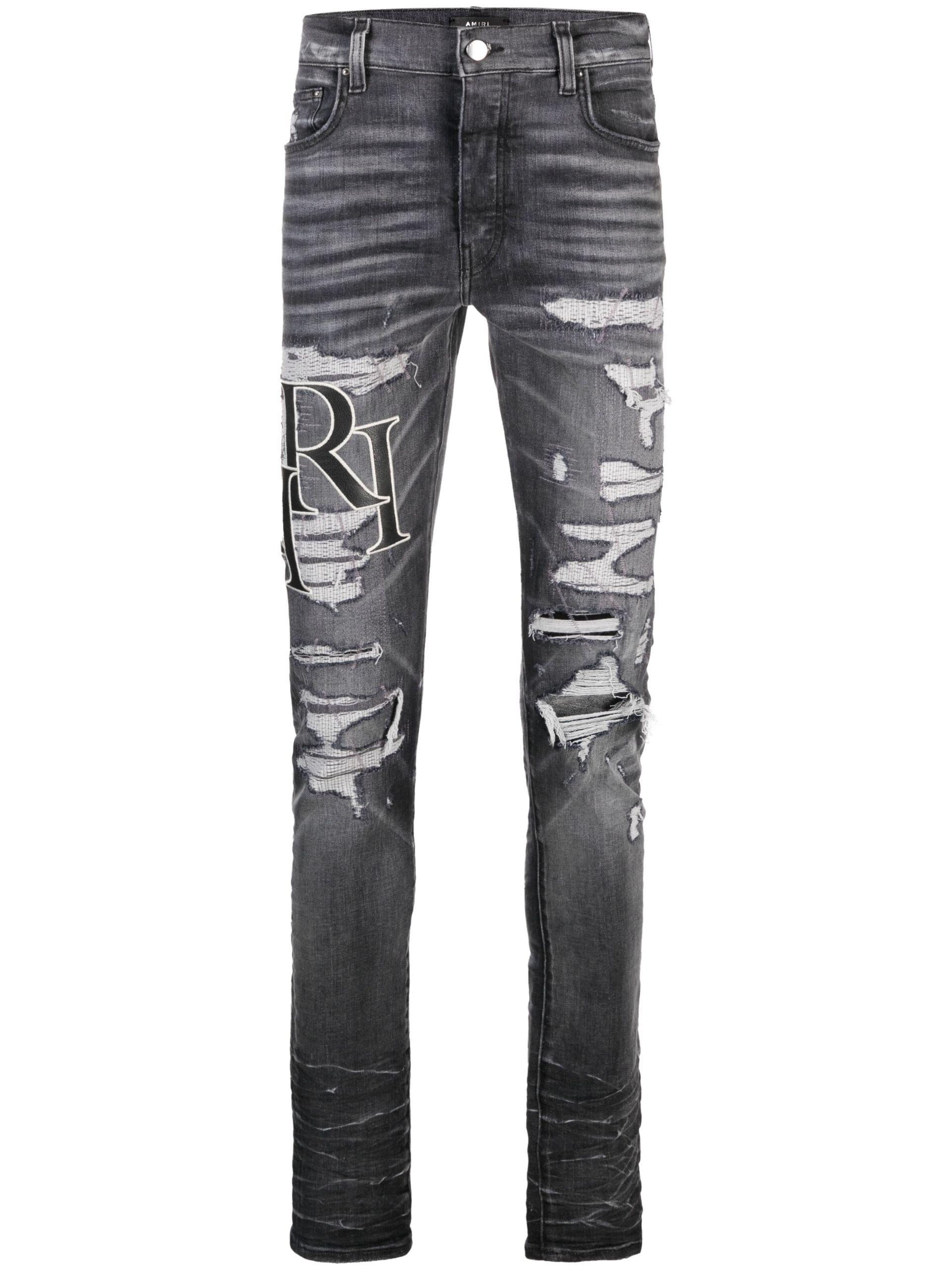 Amiri staggered Skinny Jeans in Grey for Men | Lyst UK