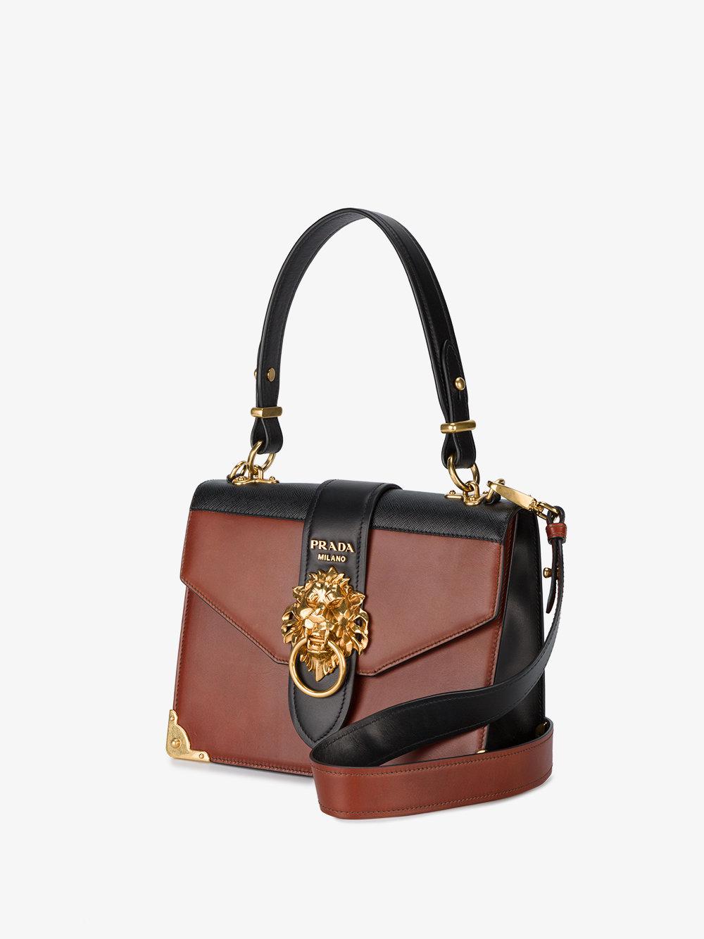prada lion head bag