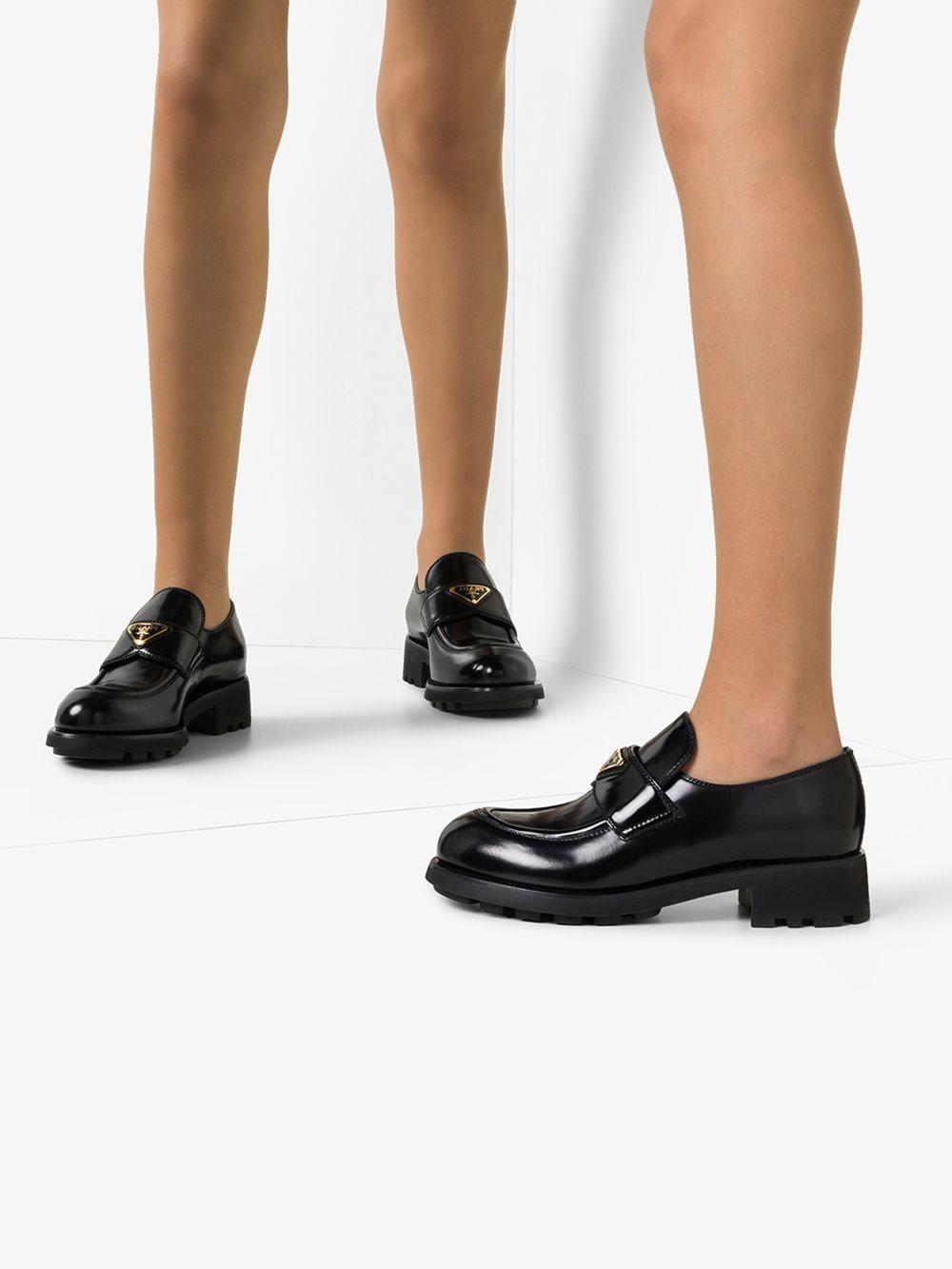 Prada Leather Chunky Logo Plaque Loafers in Black - Lyst
