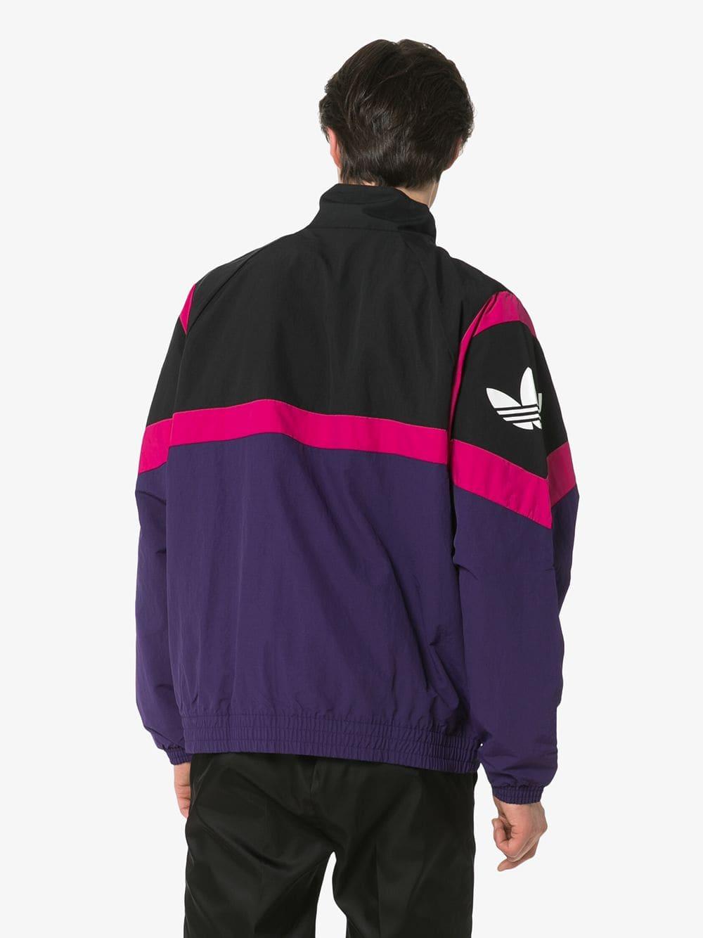 black adidas jacket with purple stripes